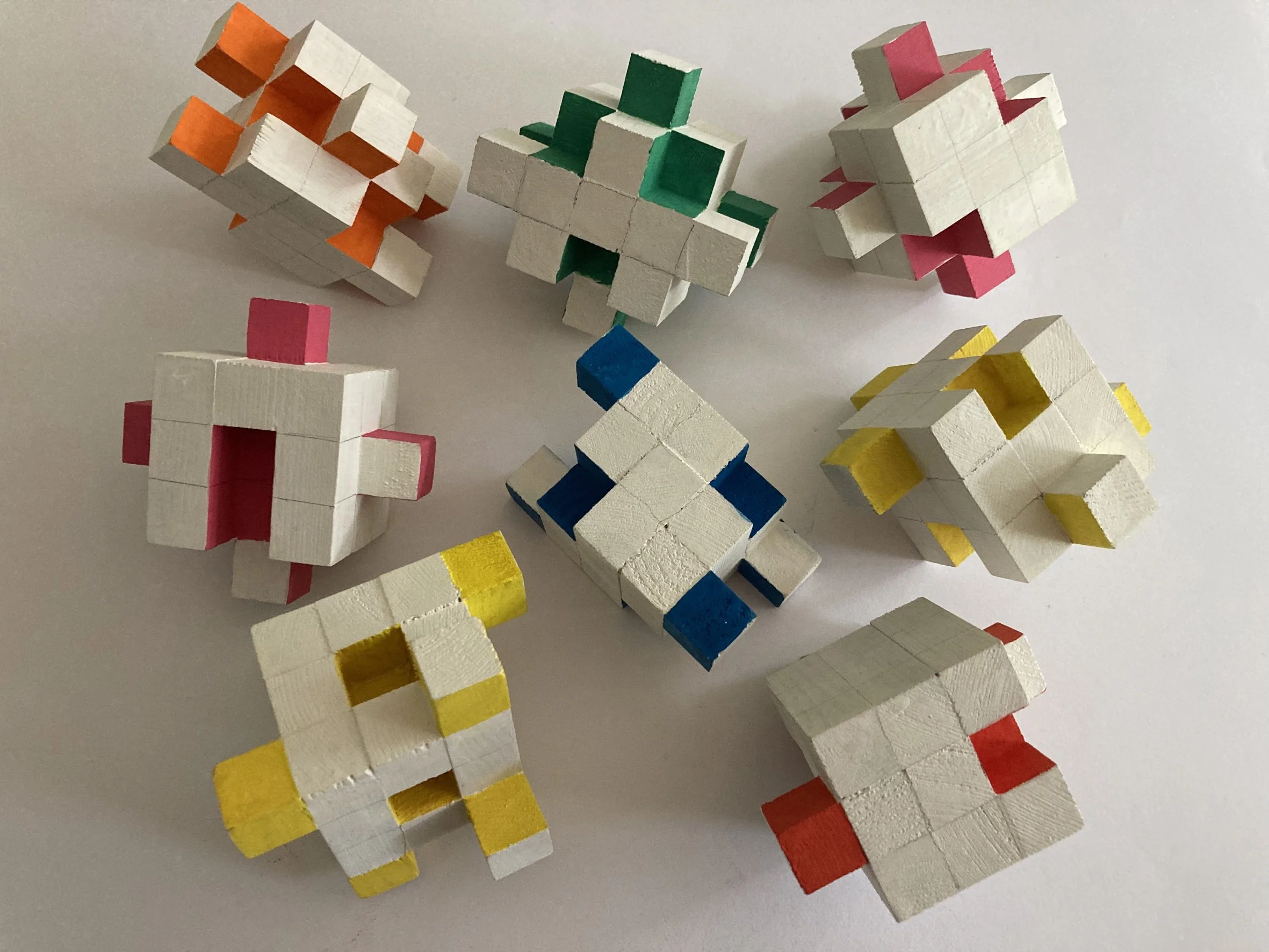 Shift Sculpture.  A group of small sculptures created by rearranging cubes.
