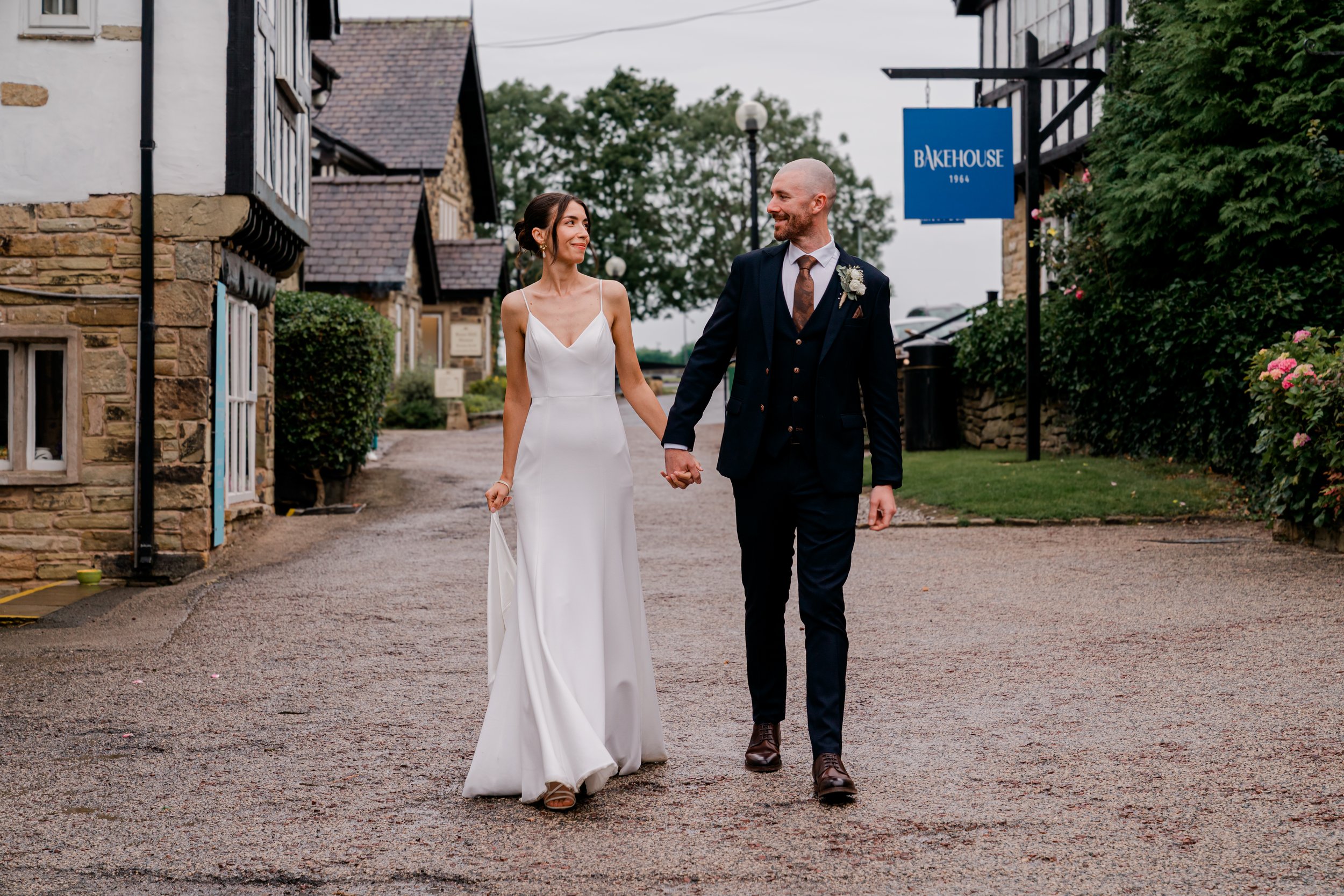 Bride and groom just just married at the last drop village, countryside wedding
