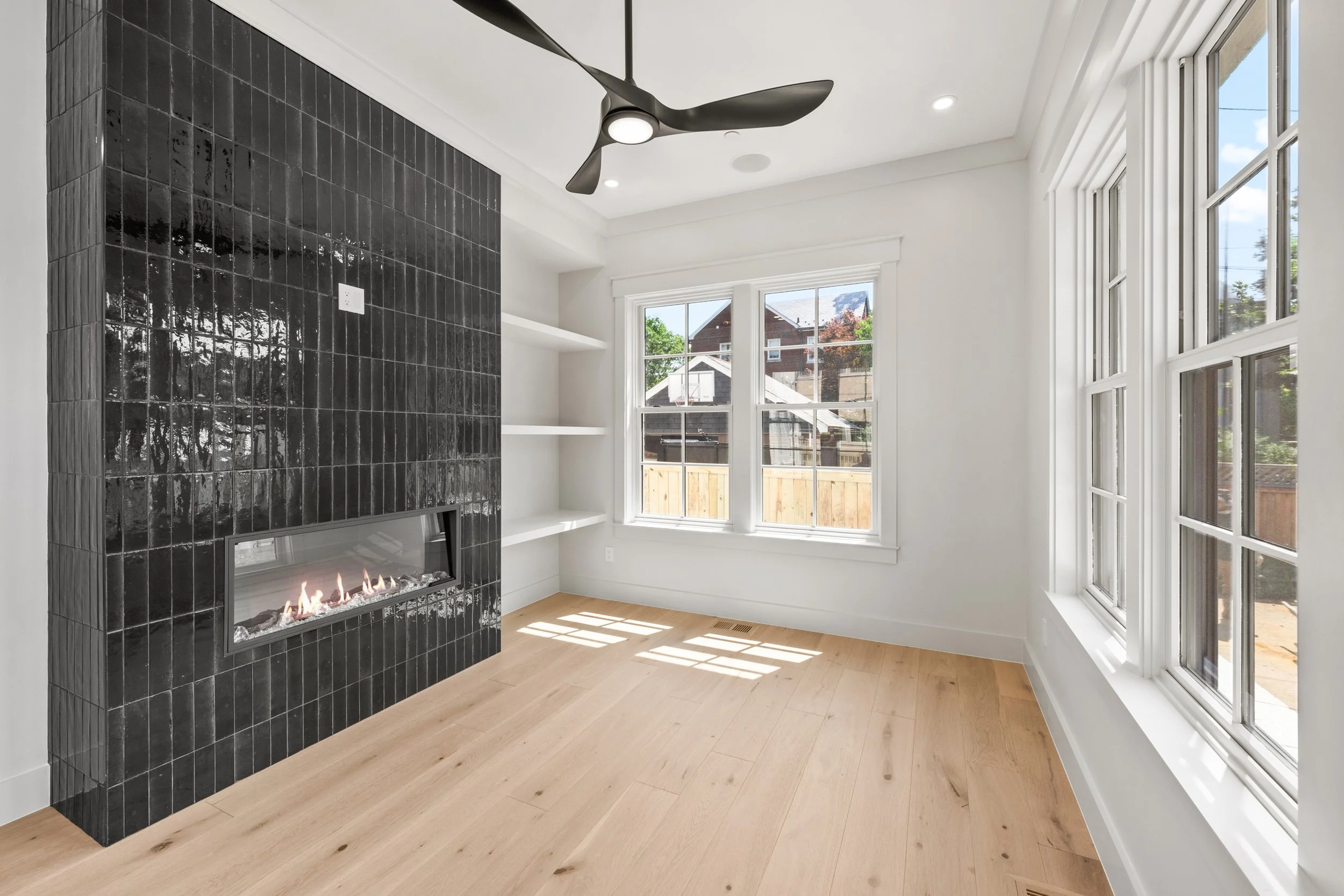 DAKS Builders 1312 Iris - 9 Interior Salon Fireplace.jpg