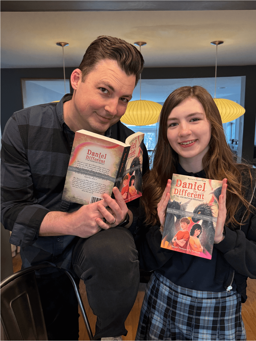 Photo of Daniel the Different authors holding books
