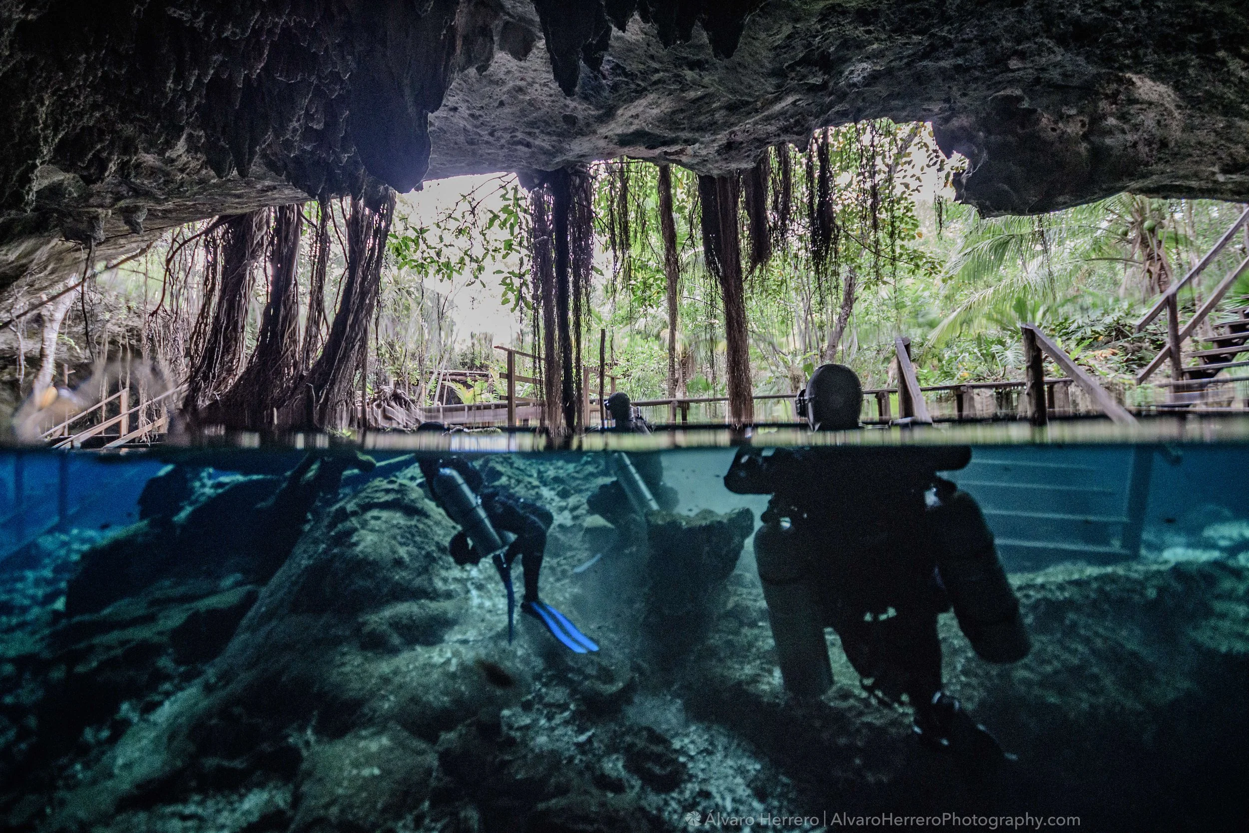 Sidemount divers preparing for a cave dive