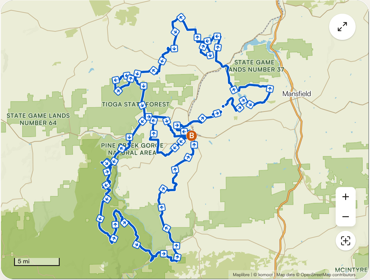 Map of a trail route through Tioga State Forest, Pine Creek Gorge Natural Area, and surrounding parks, featuring numerous trail markers and a starting point labeled B near Mansfield, Pennsylvania.