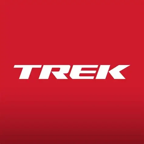 Trek logo on a red gradient background.