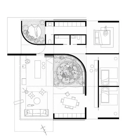 Architectural floor plan showing rooms including bedrooms, a living room, dining area, and bathrooms with measurements and layout details.