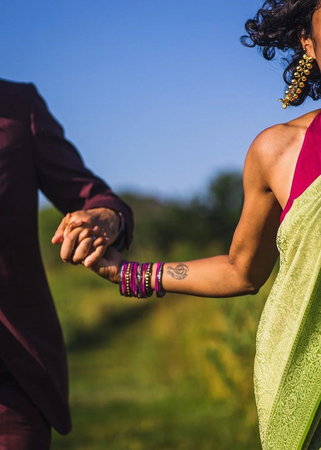Just out of frame: broad grins and gasps for breath as they run toward their shared future.