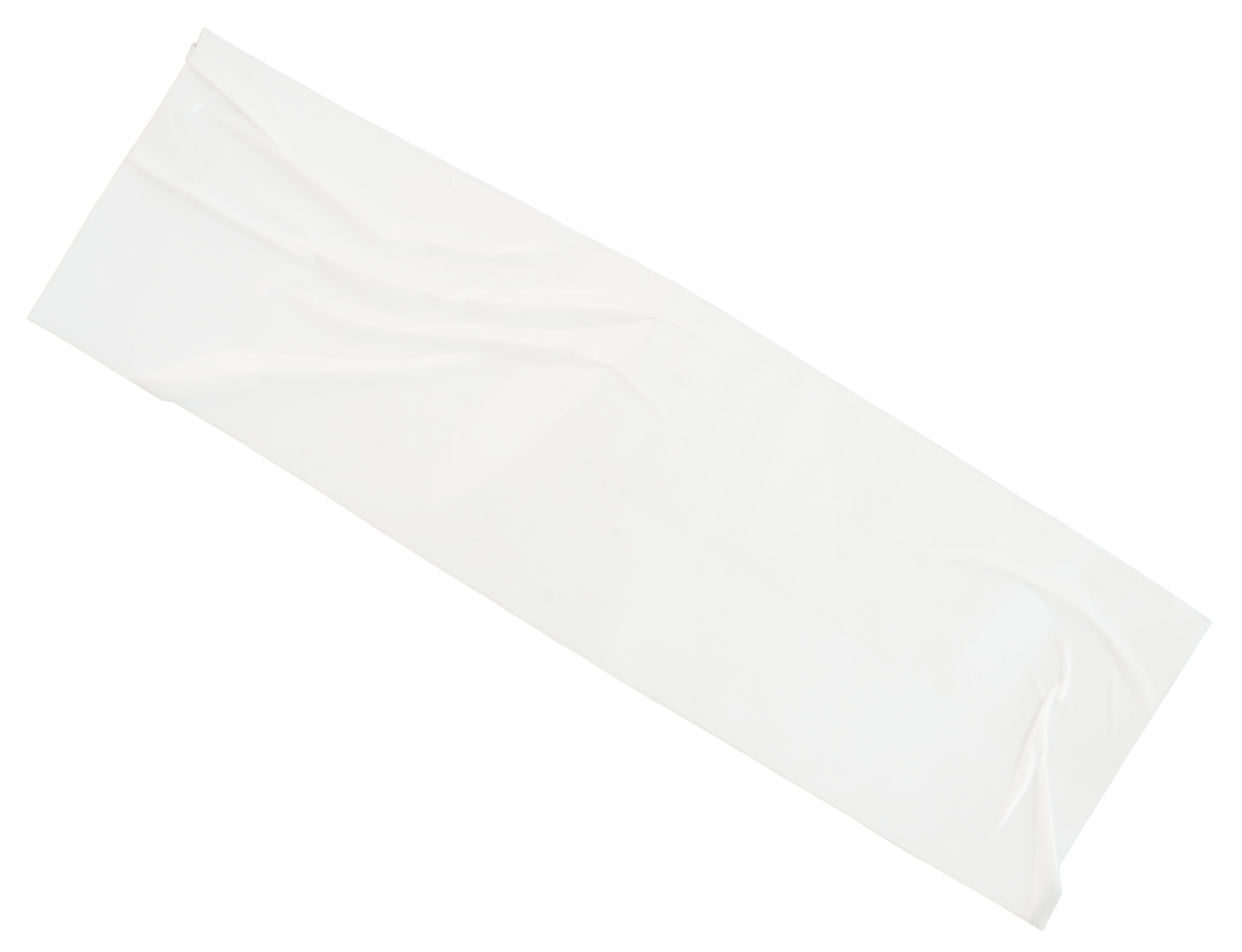 A white rectangular package wrapped in plain paper.