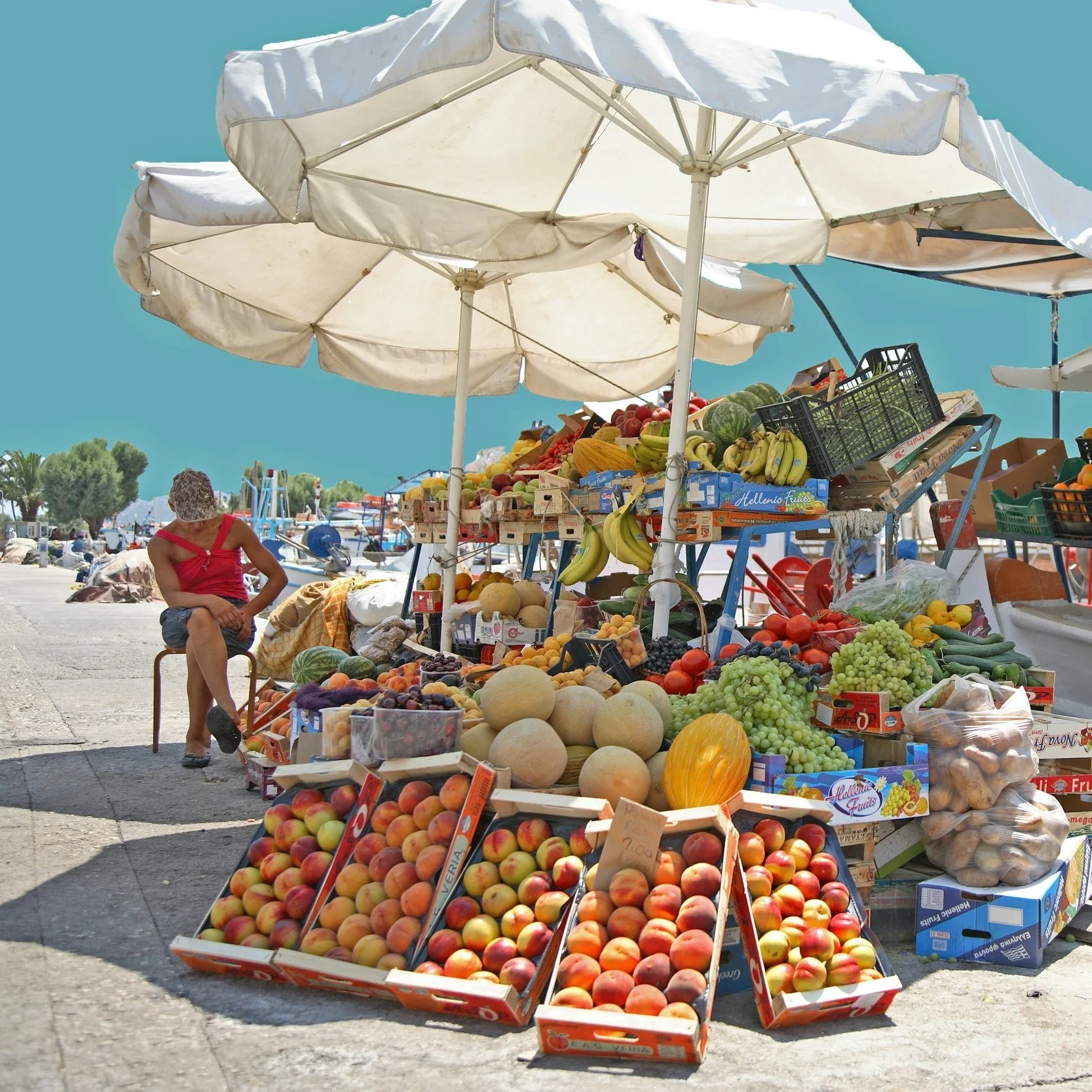 Local Greek market bursting with colour, flavour, and ingredients that inspire our retreat menus