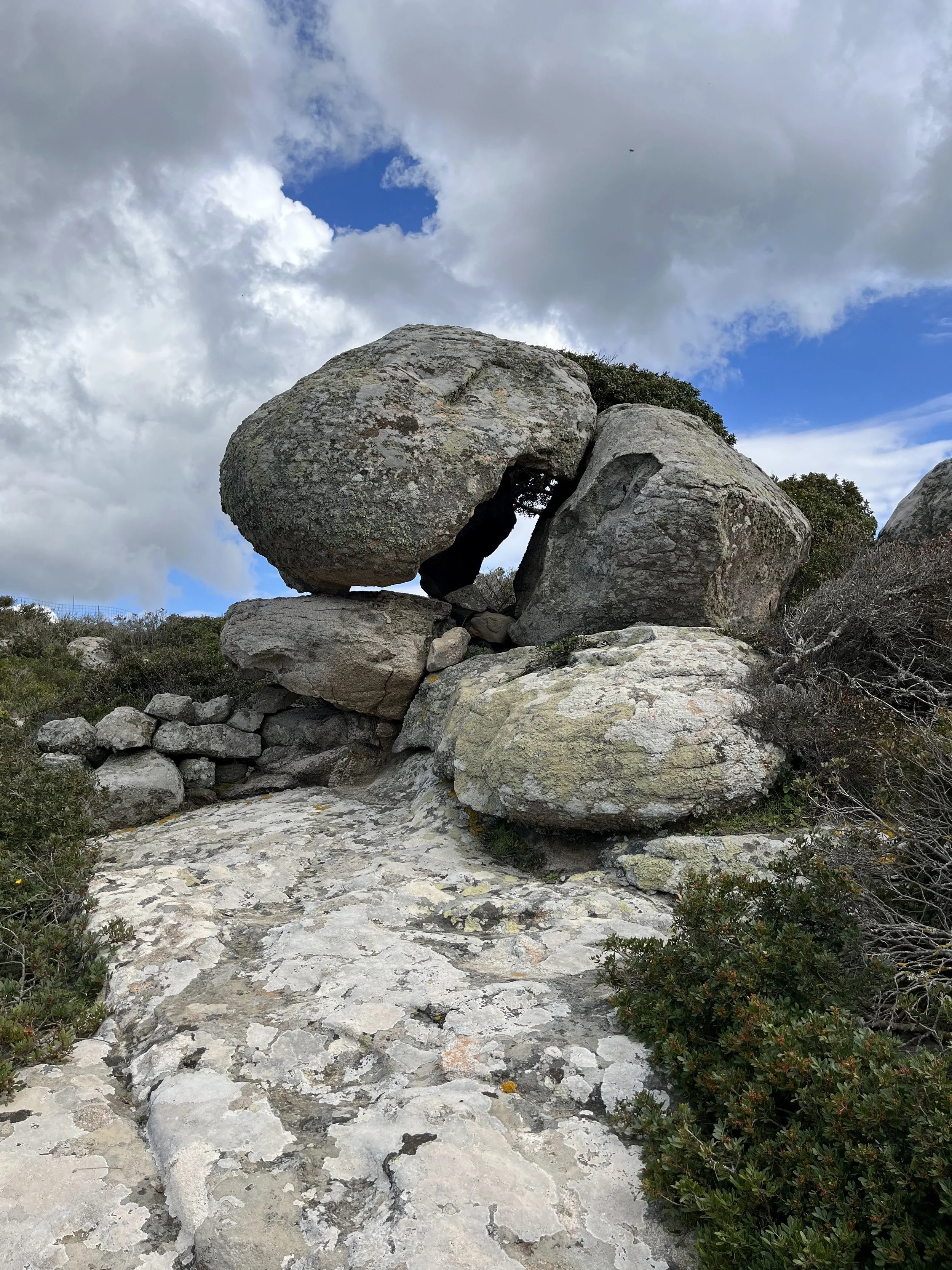 Natural rock formation balanced in the Greek hills—quiet power in the everyday landscape