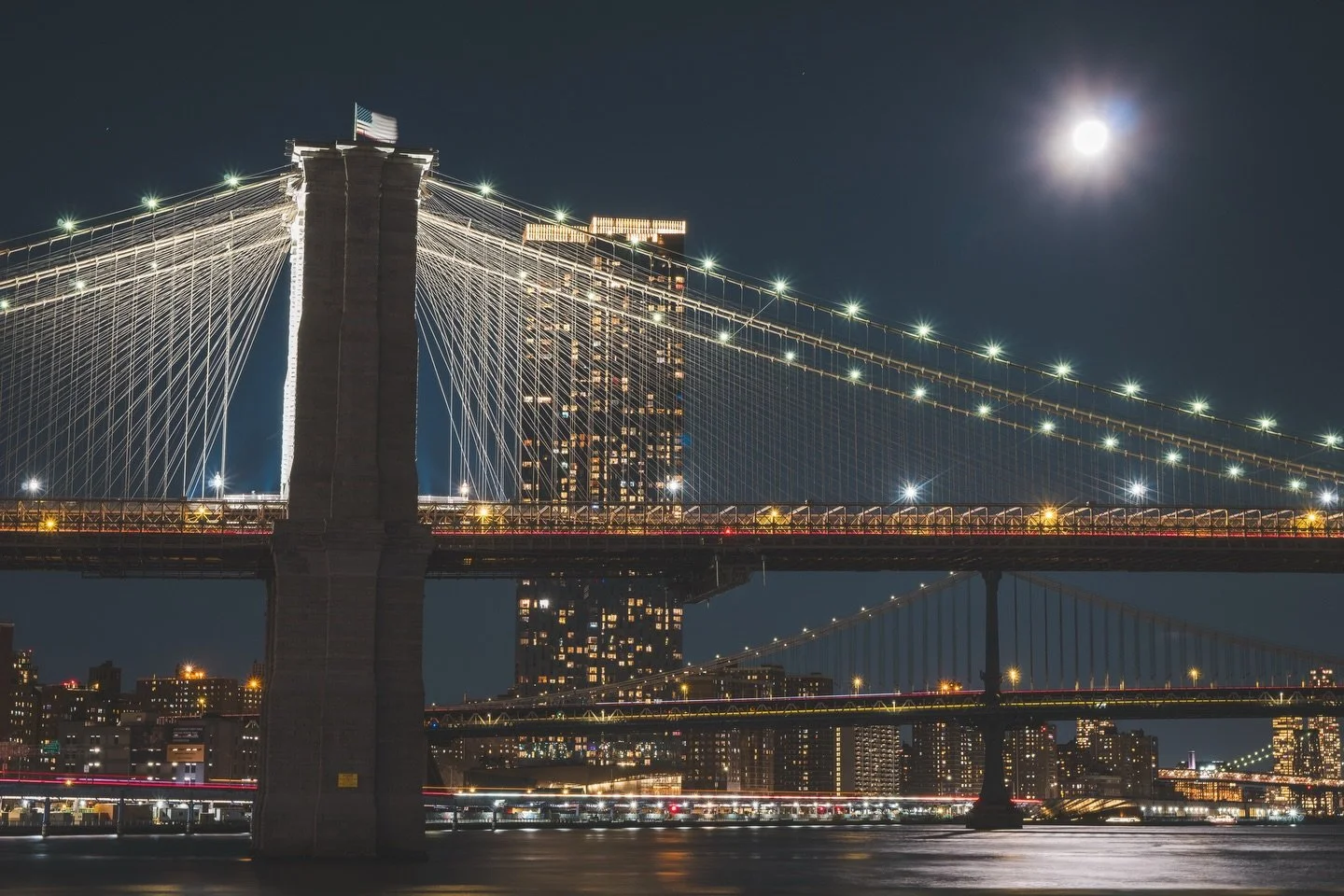 Full Cold Moon over Brooklyn Bridge on December 4, 2025
