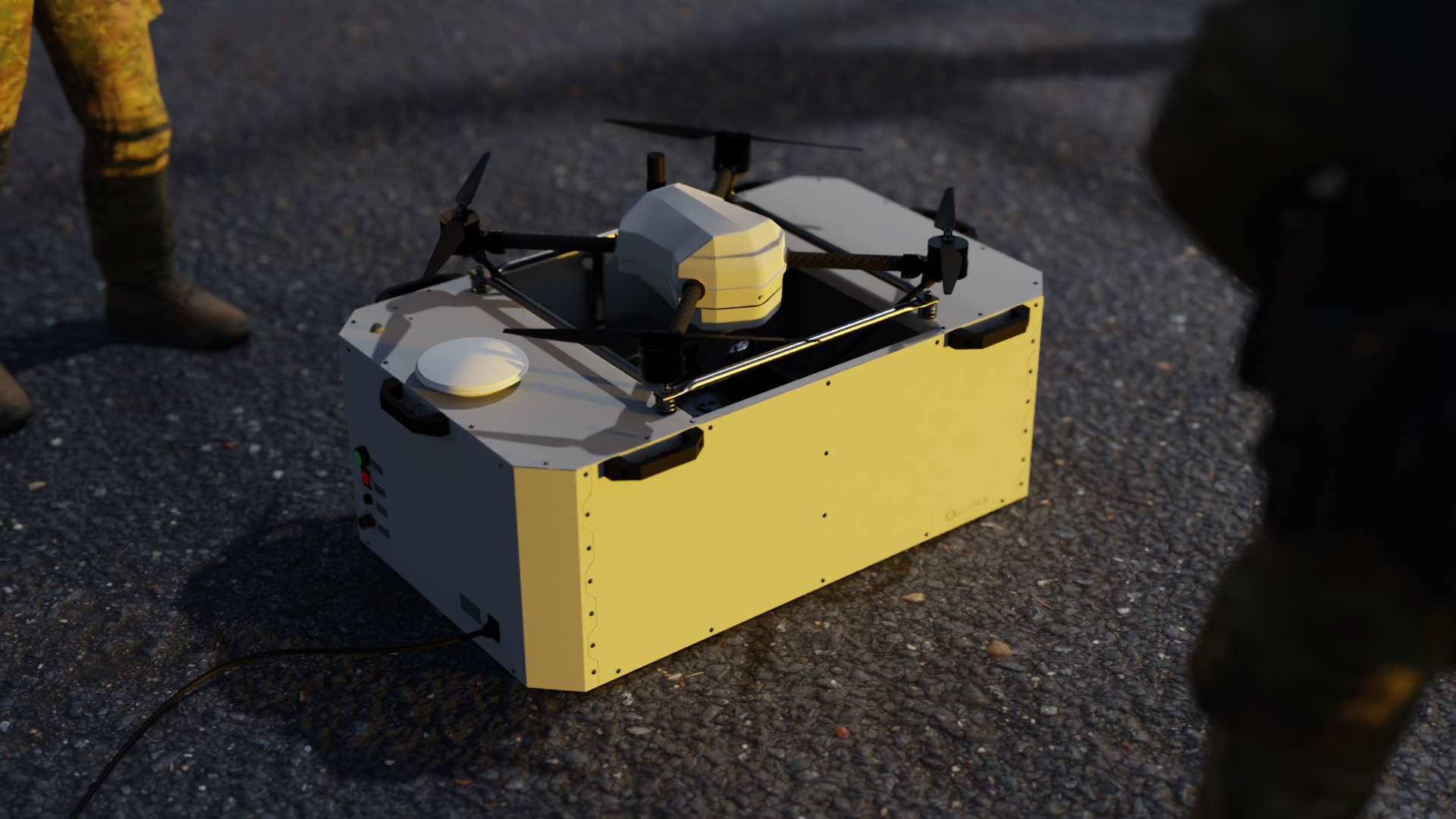 A white robotic drone with four propellers resting on a black gravel ground, surrounded by people in outdoor military-style clothing.