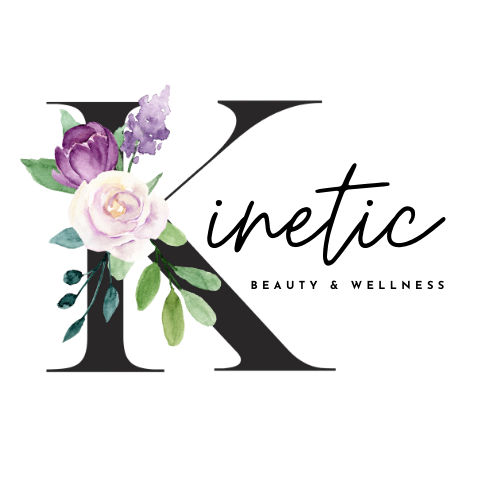 Letter K decorated with purple and white flowers and green foliage
