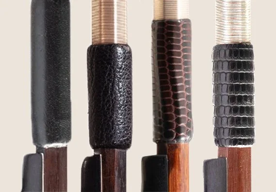 Close-up of four different types of thumb leathers