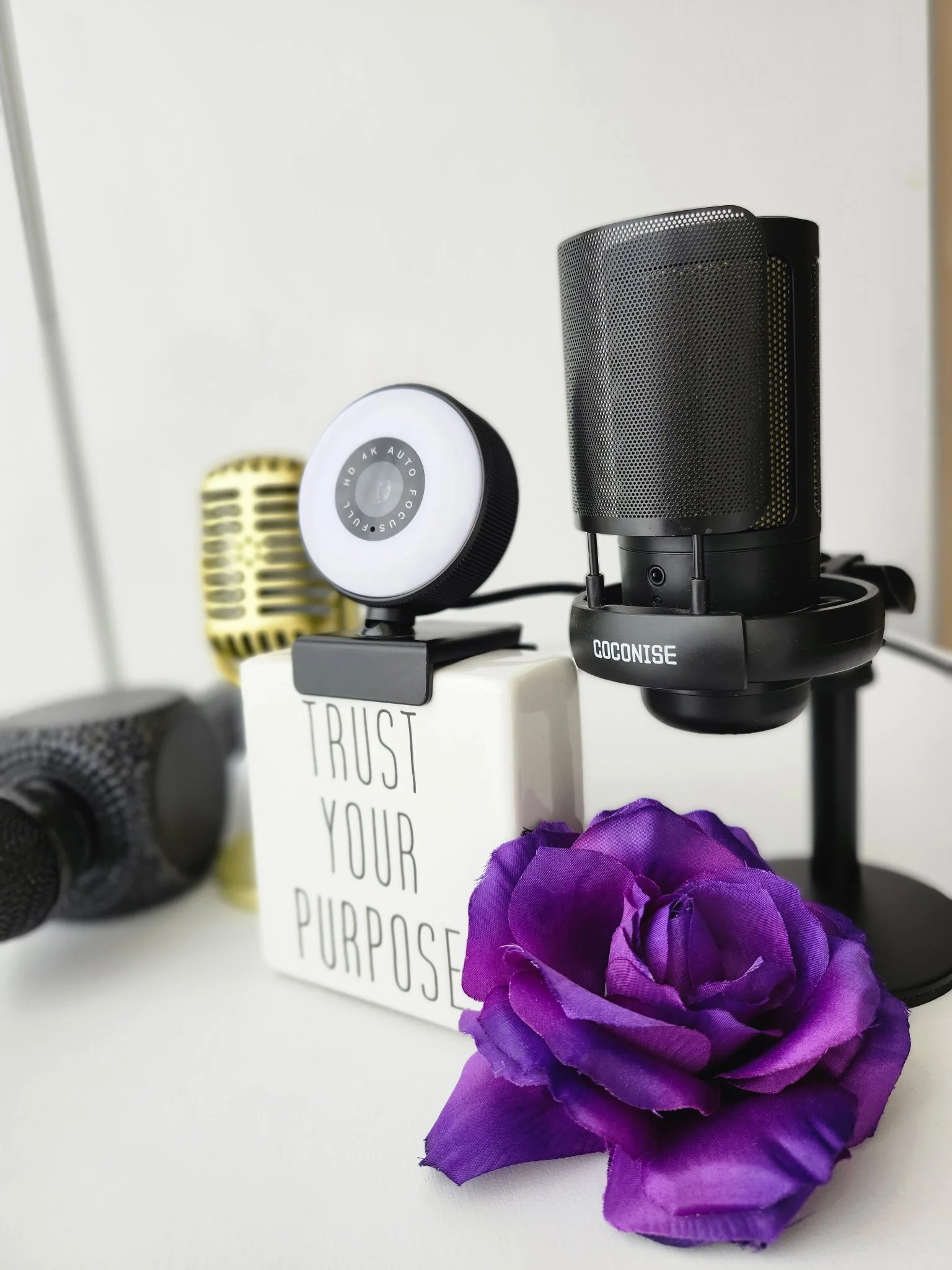 Close-up of vintage microphone with colorful abstract background