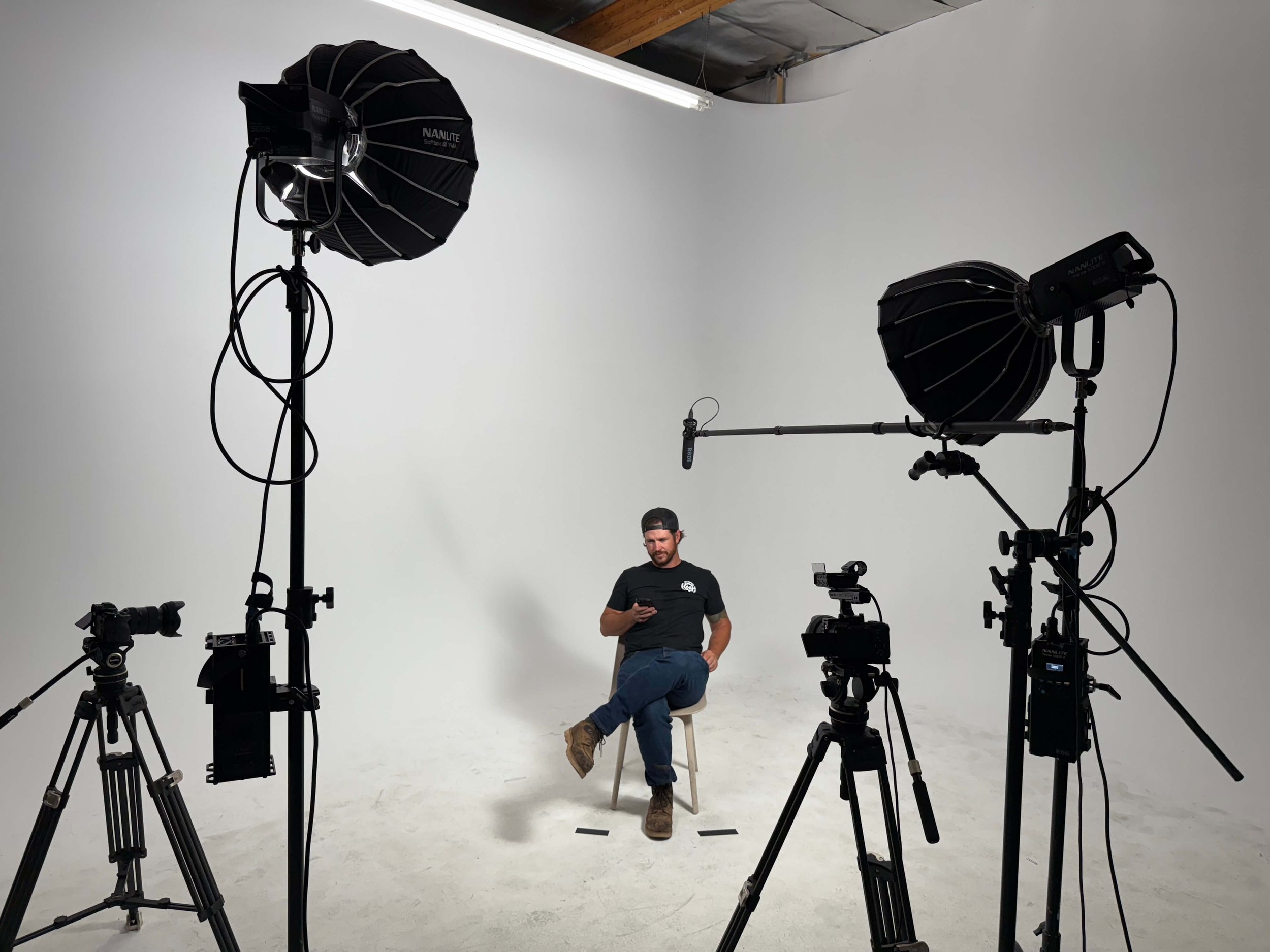 Professional interview video production studio setup with lighting and camera equipment in Phoenix