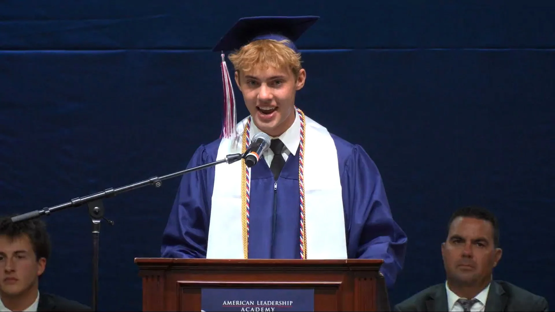 Graduation ceremony livestreaming at a Phoenix area school with a student speaker at the podium