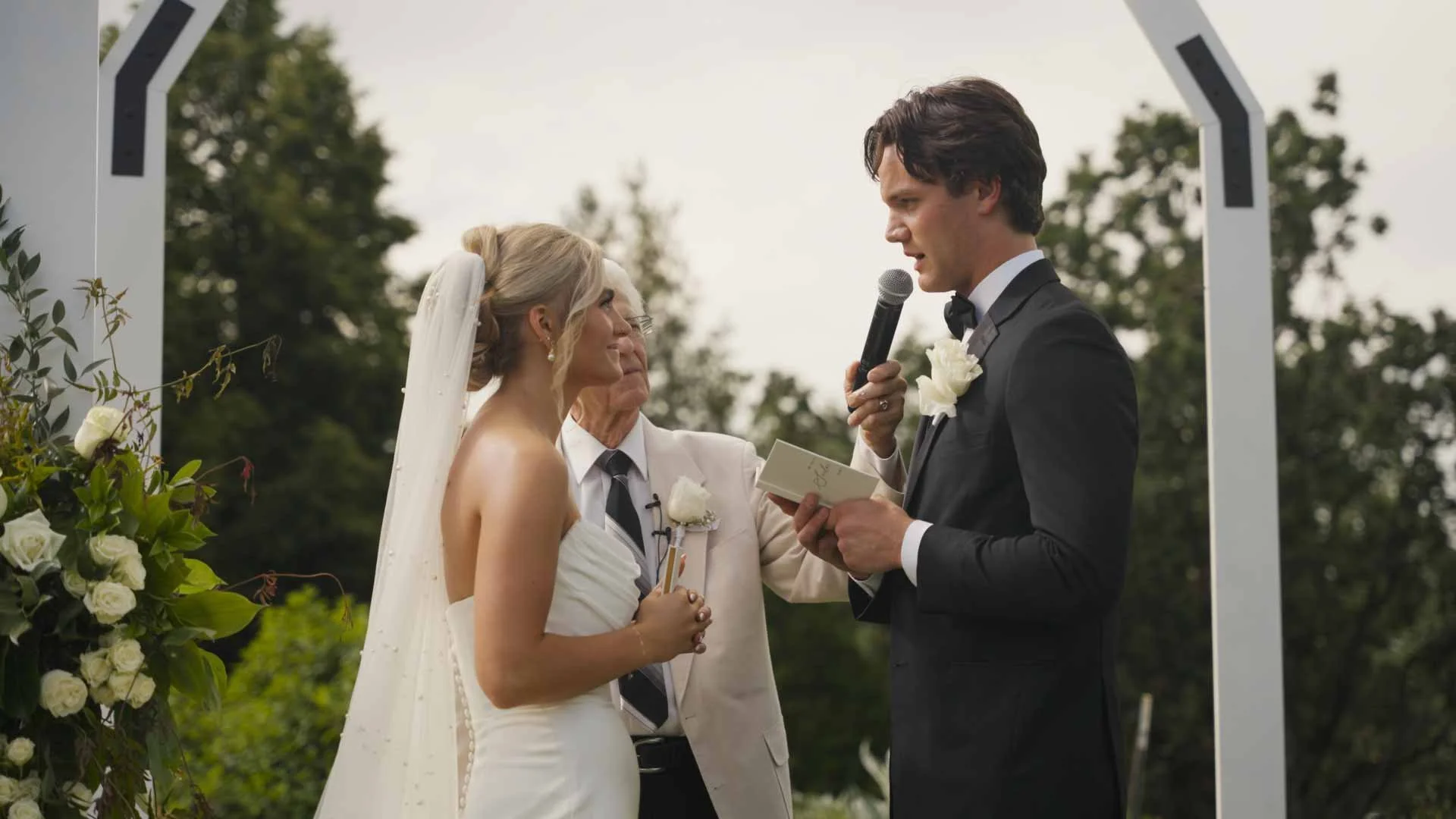 Wedding livestreaming capturing vows at an outdoor Phoenix area wedding ceremony