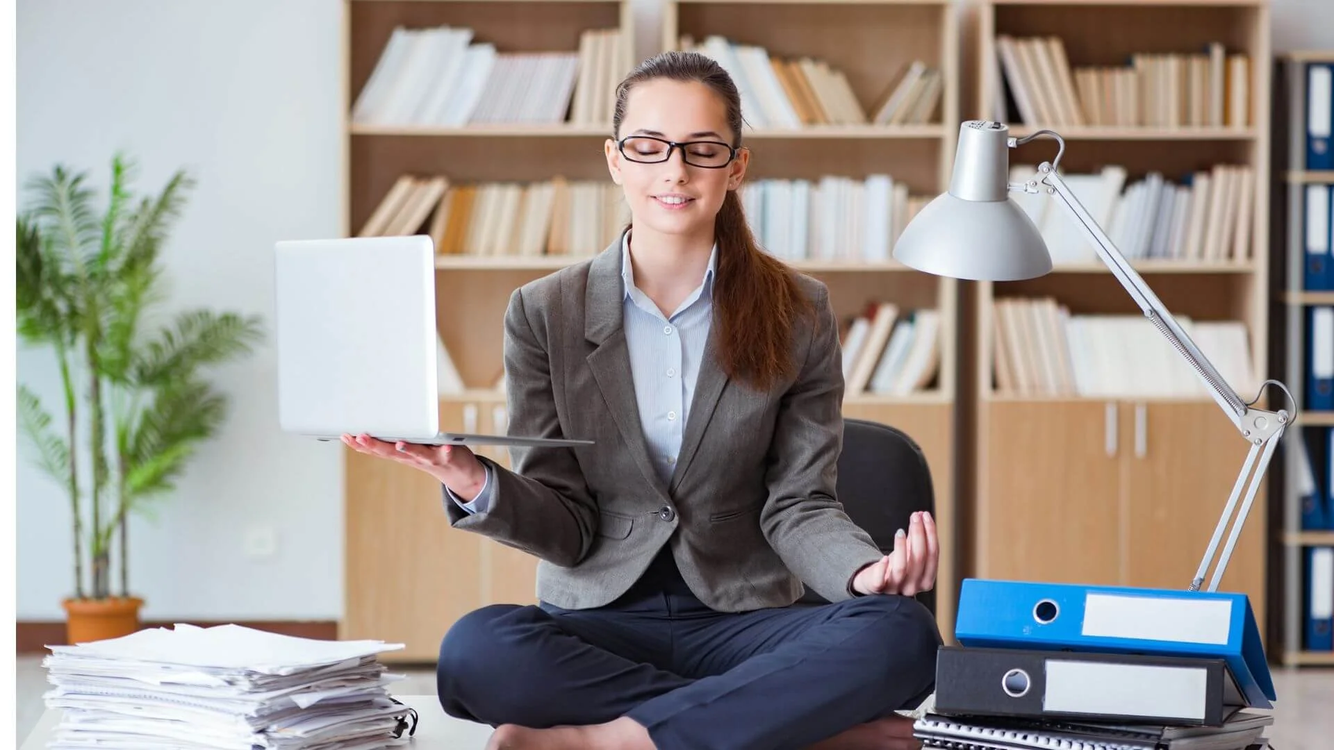 a perfect plan office worker meditating balancing stress and results coaching