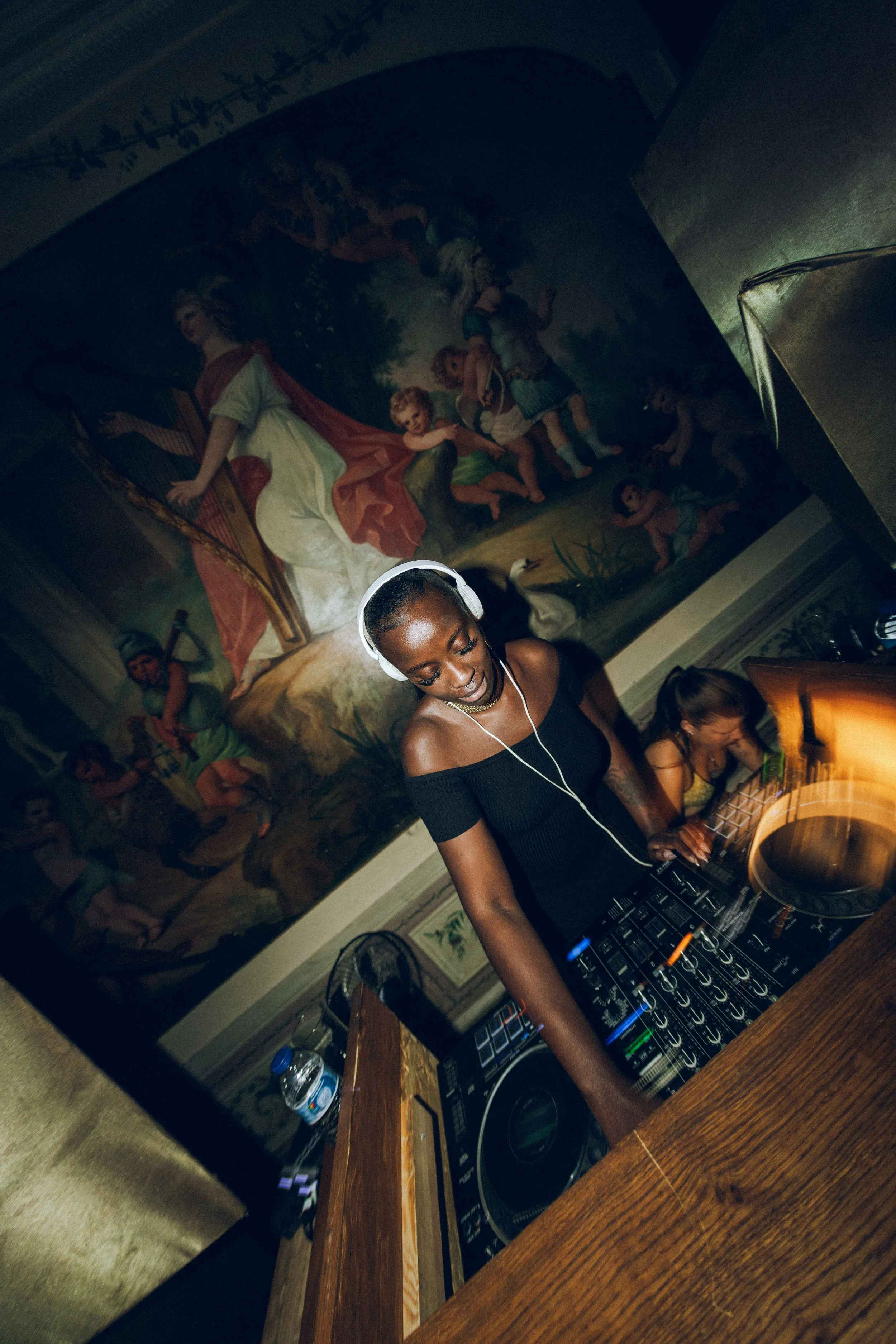 UMAFRICANA performing a DJ set at Palácio do Grilo in Lisbon during a club night.