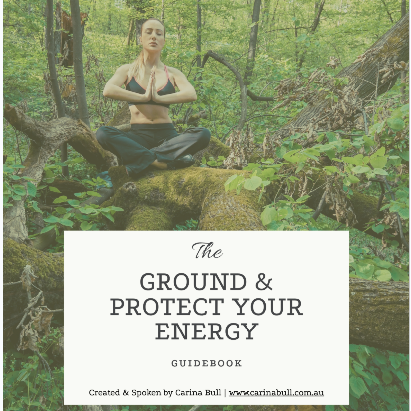 Carina Bull meditating in a forest surrounded by lush greenery. Cover of The Ground & Protect Your Energy Guidebook, part of a 9-minute grounding and protection visualization download.