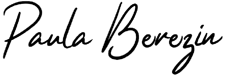 The word "Love" written in elegant, cursive black lettering on a dark background.