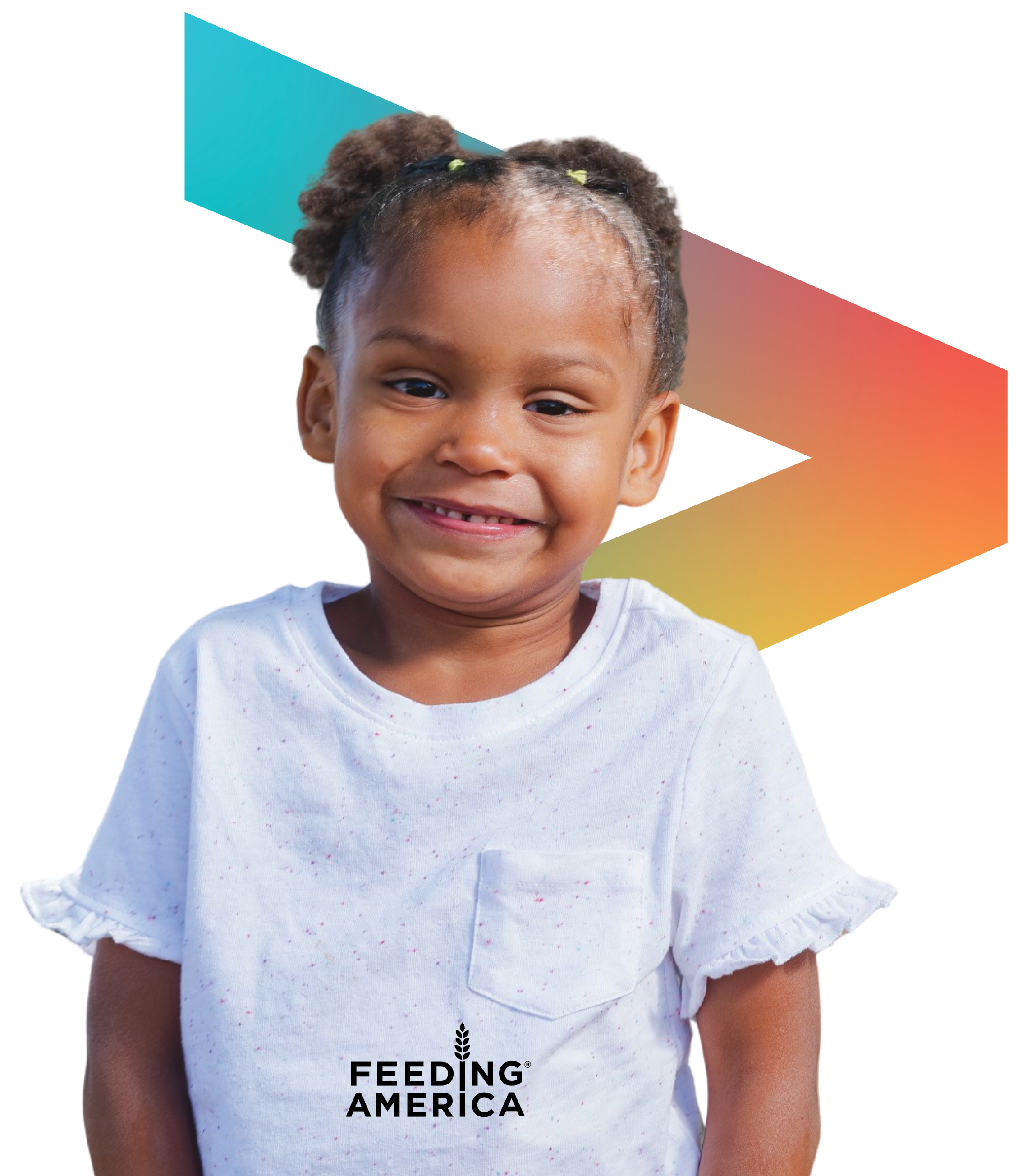 Close-up of a smiling young girl with dark hair styled in puffs, wearing a white shirt with small colorful specks and ruffled sleeves, against a colorful background. The shirt has the logo 'FEEDING AMERICA' printed on it.