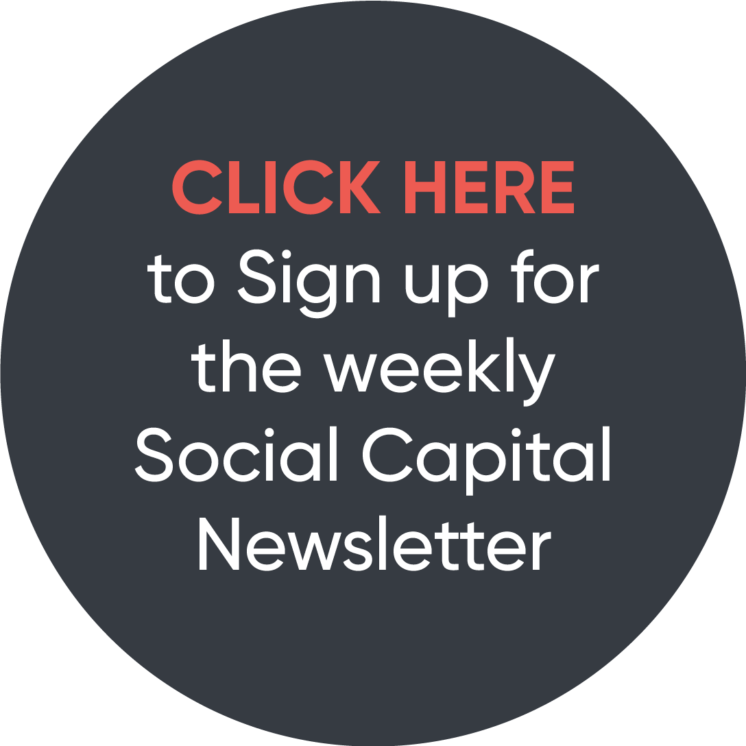 A circular button with dark background and text encouraging users to click to sign up for a social capital newsletter.
