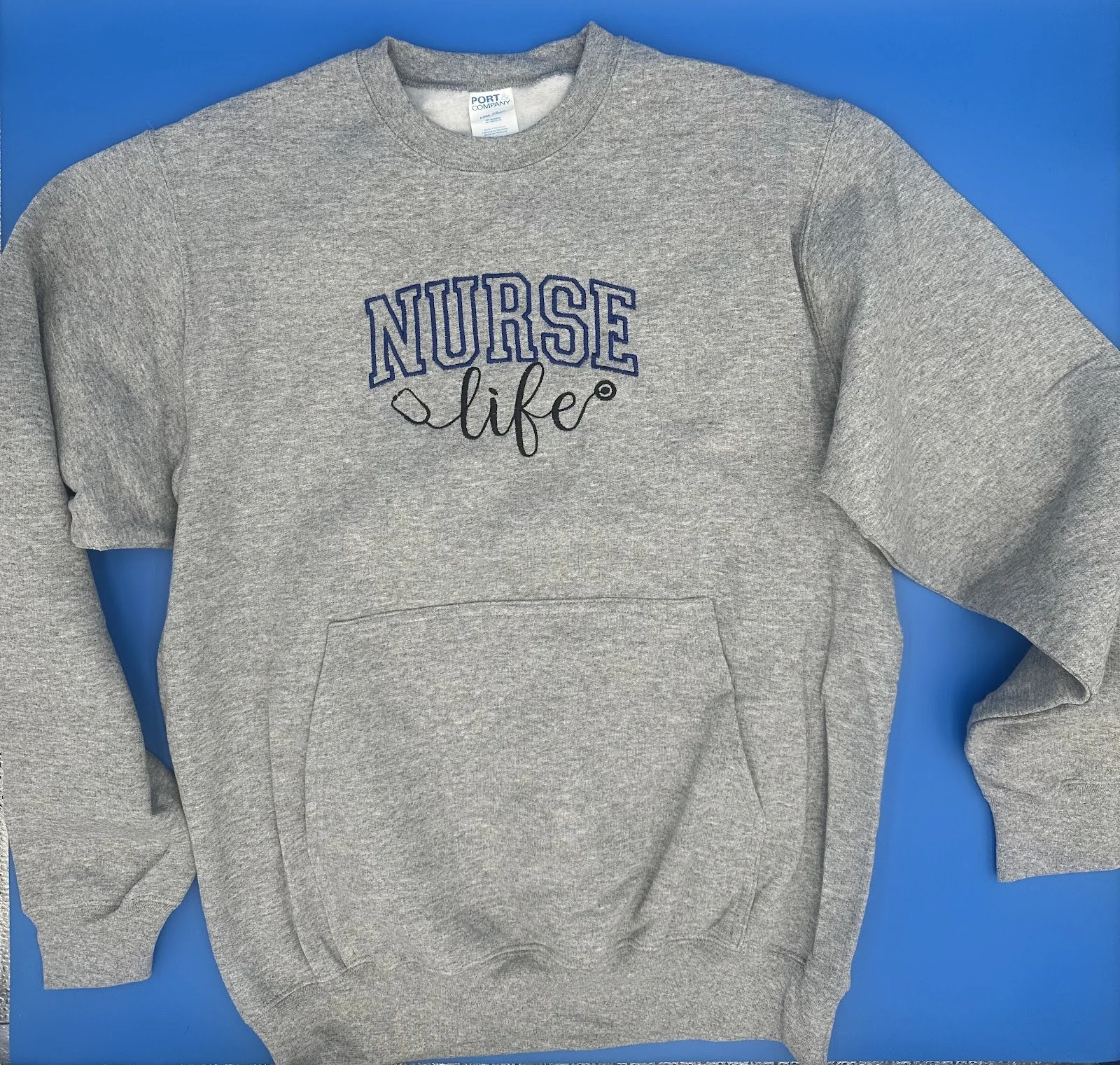 Heather - Crew neck with pocket 'Nurse Life' Embroidered.jpg