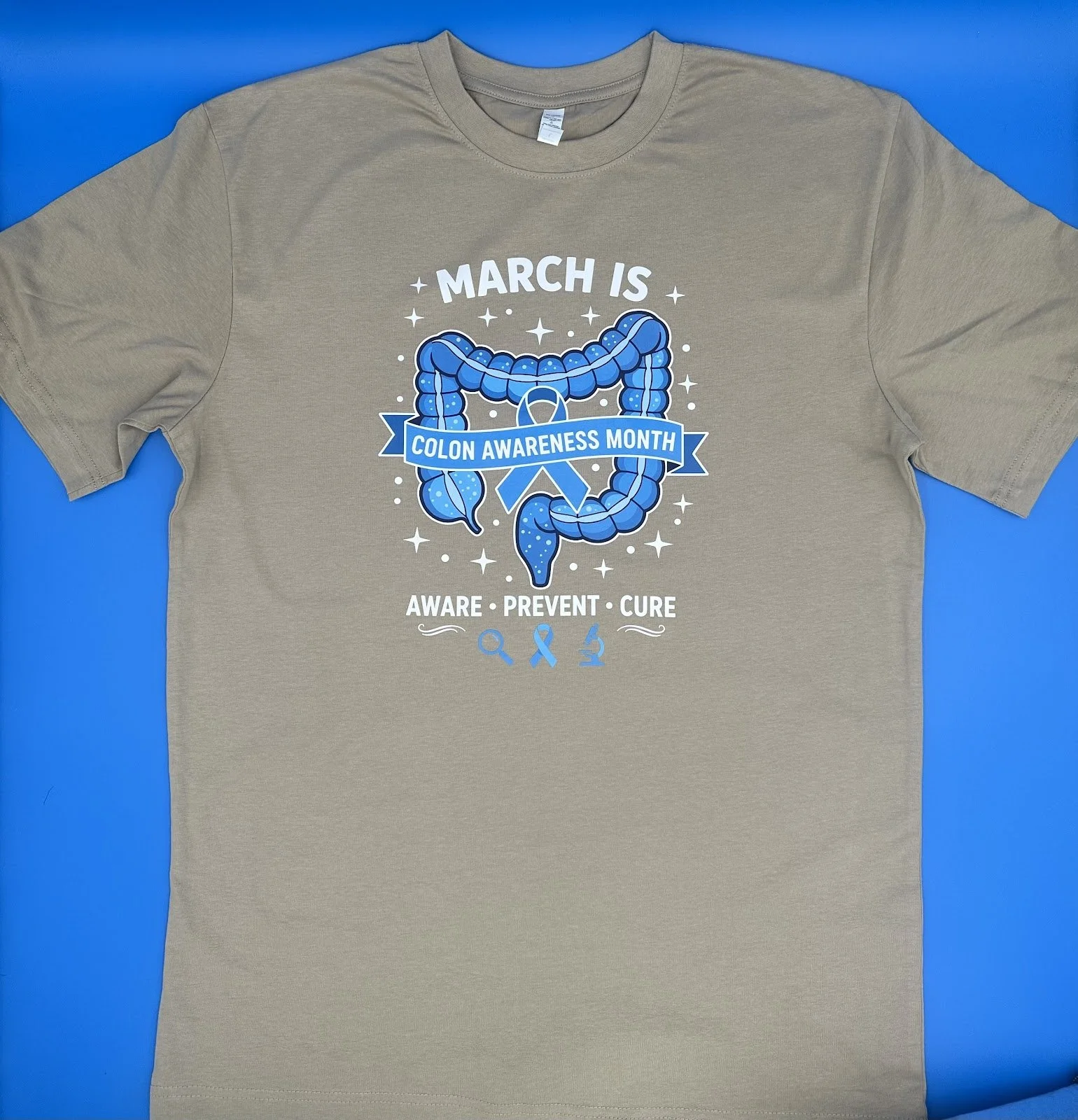 Sand - T-Shirt 'March is Colon Awareness Month' Heat Press.jpeg