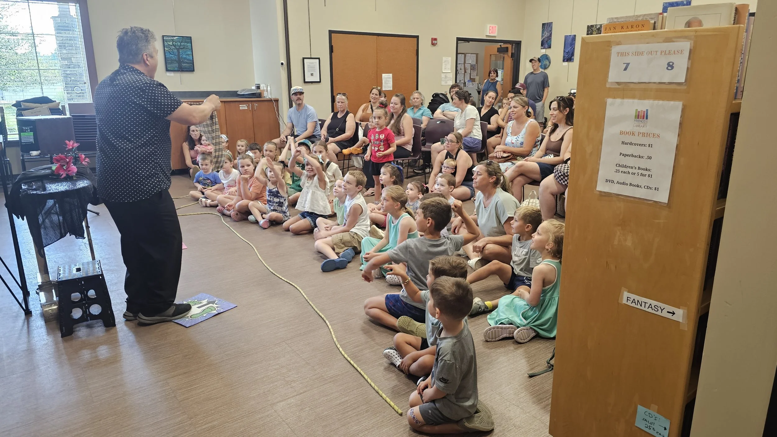 Magician in front of crowd