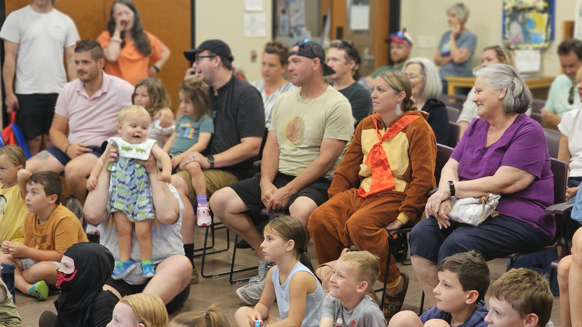 smiling audience at the Kingston Community library
