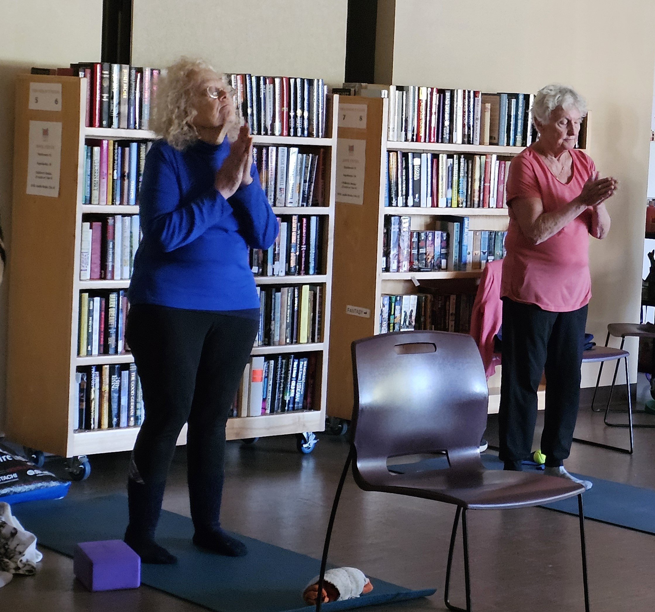 women doing yoga at the library