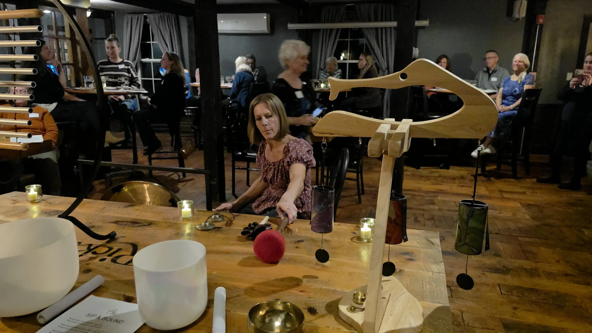 A view of Laura's instruments while she plays and the room watches