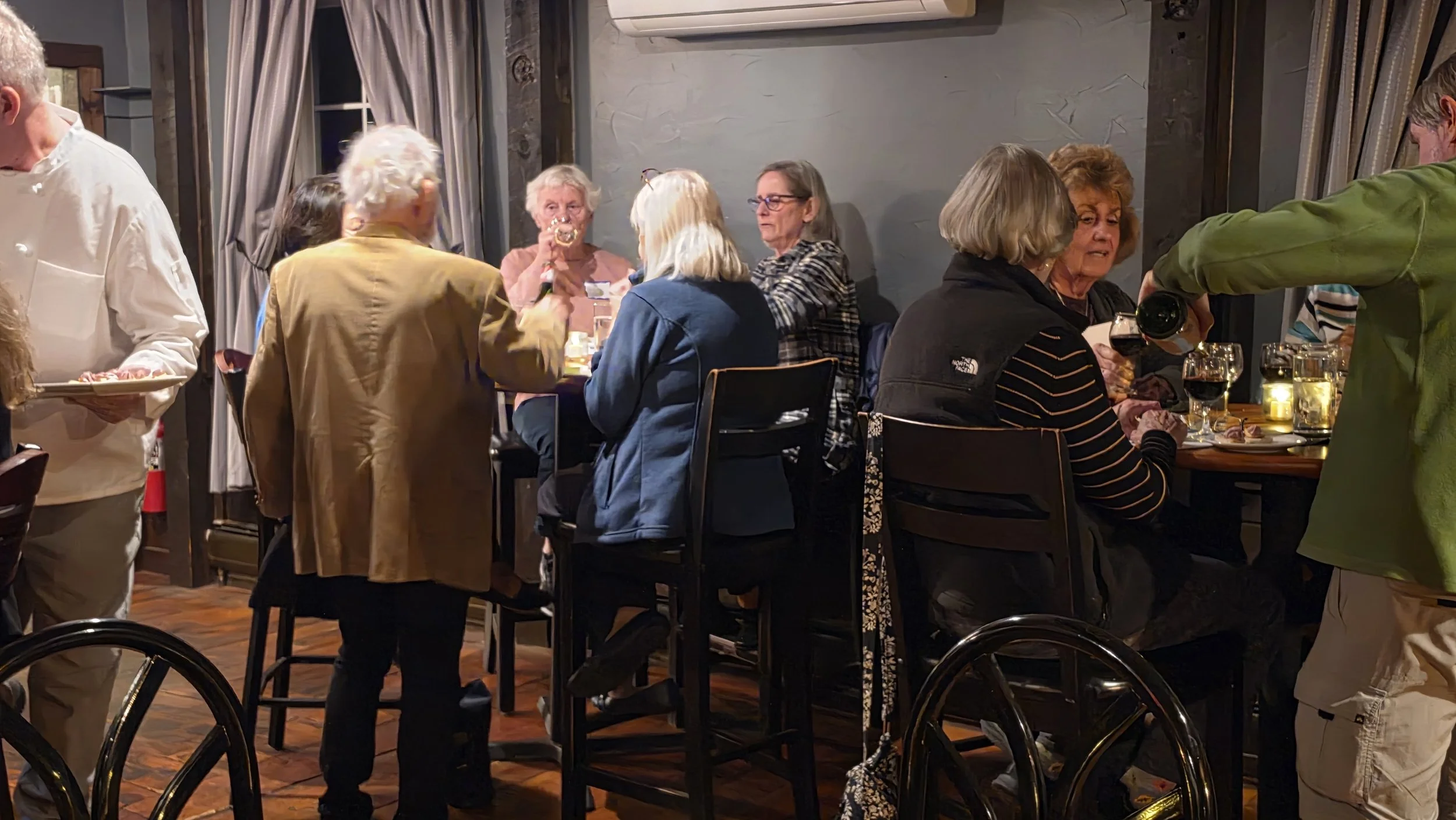 Guests enjoy conversation between wine and sound pairings