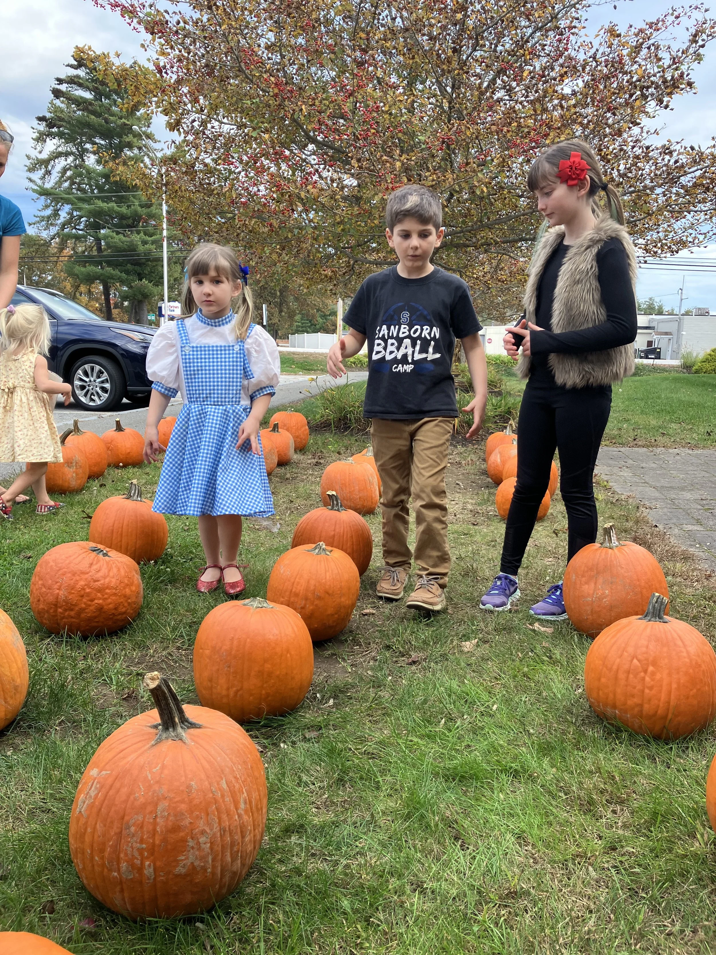kids in "pumpkin patch"