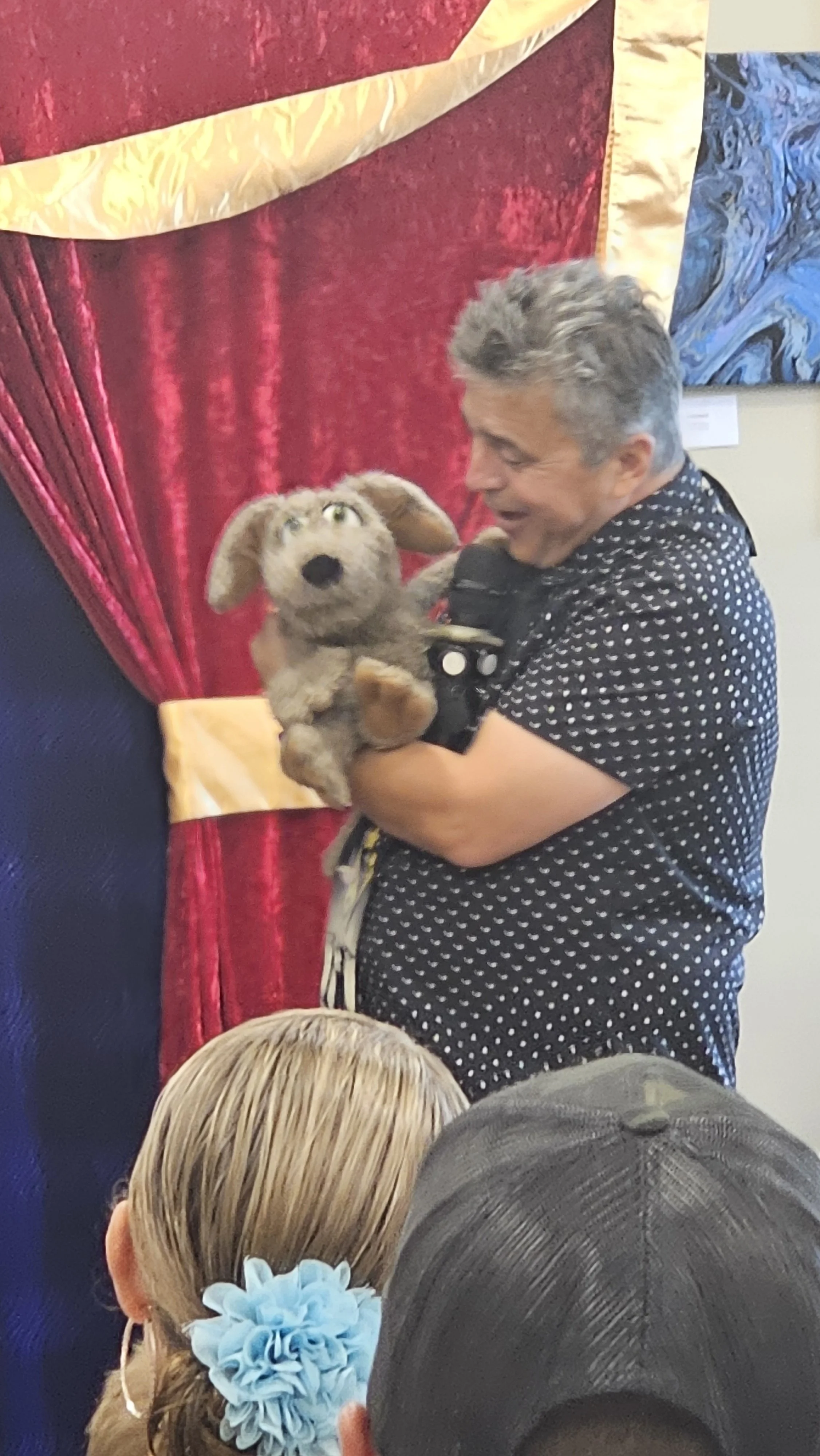 Magic Fred's puppet dog works the crowd