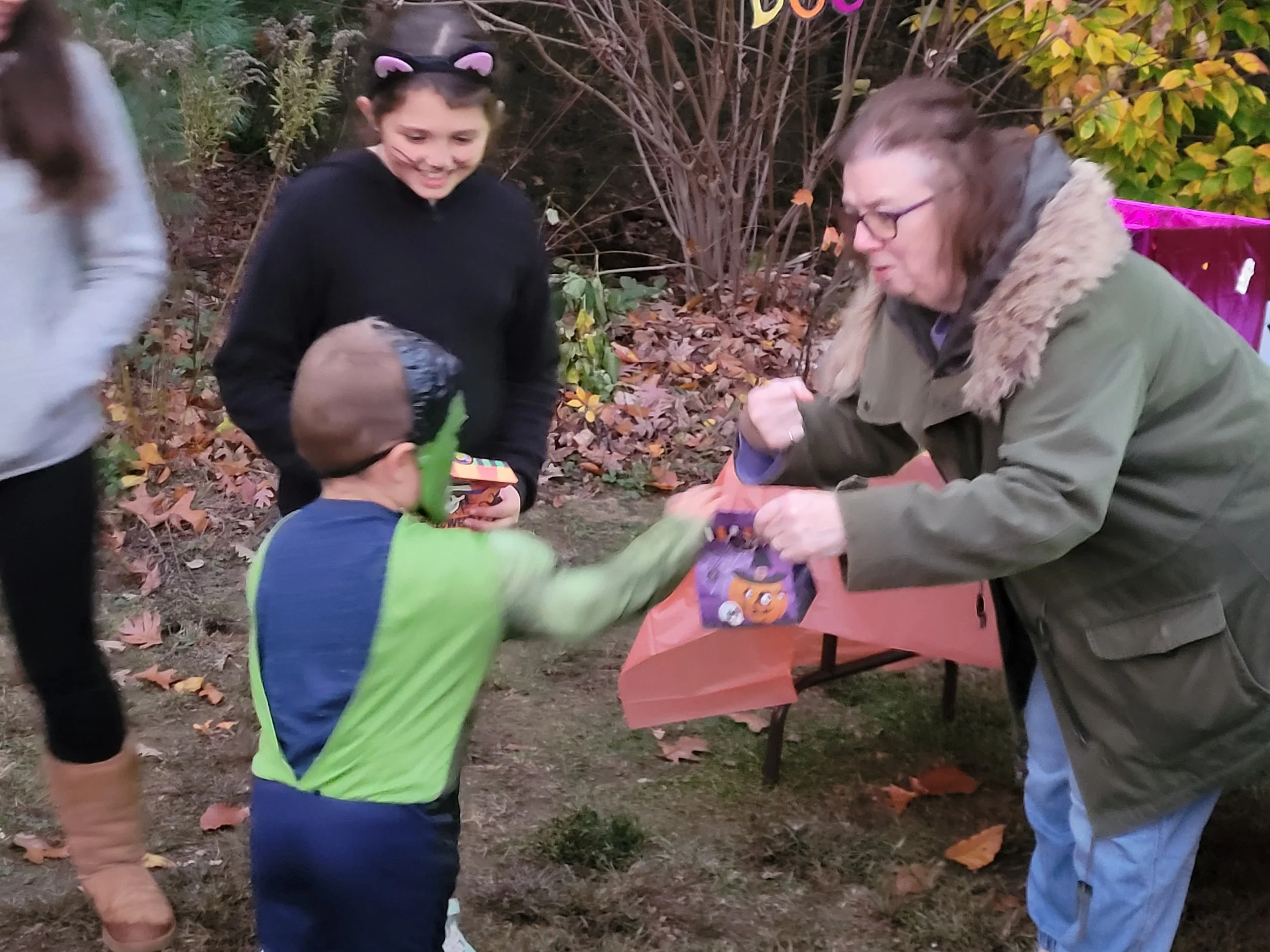 Friends handing out candy