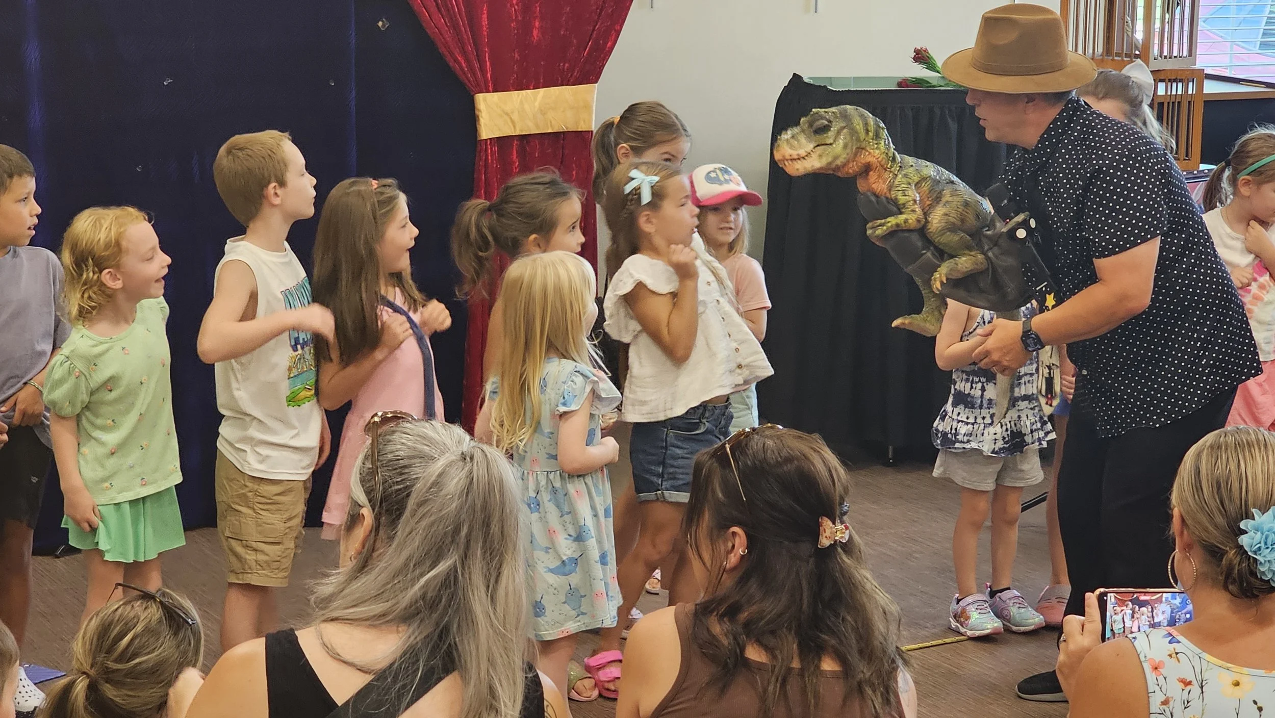 The puppet dinosaur thrills the kids at Magic Fred show