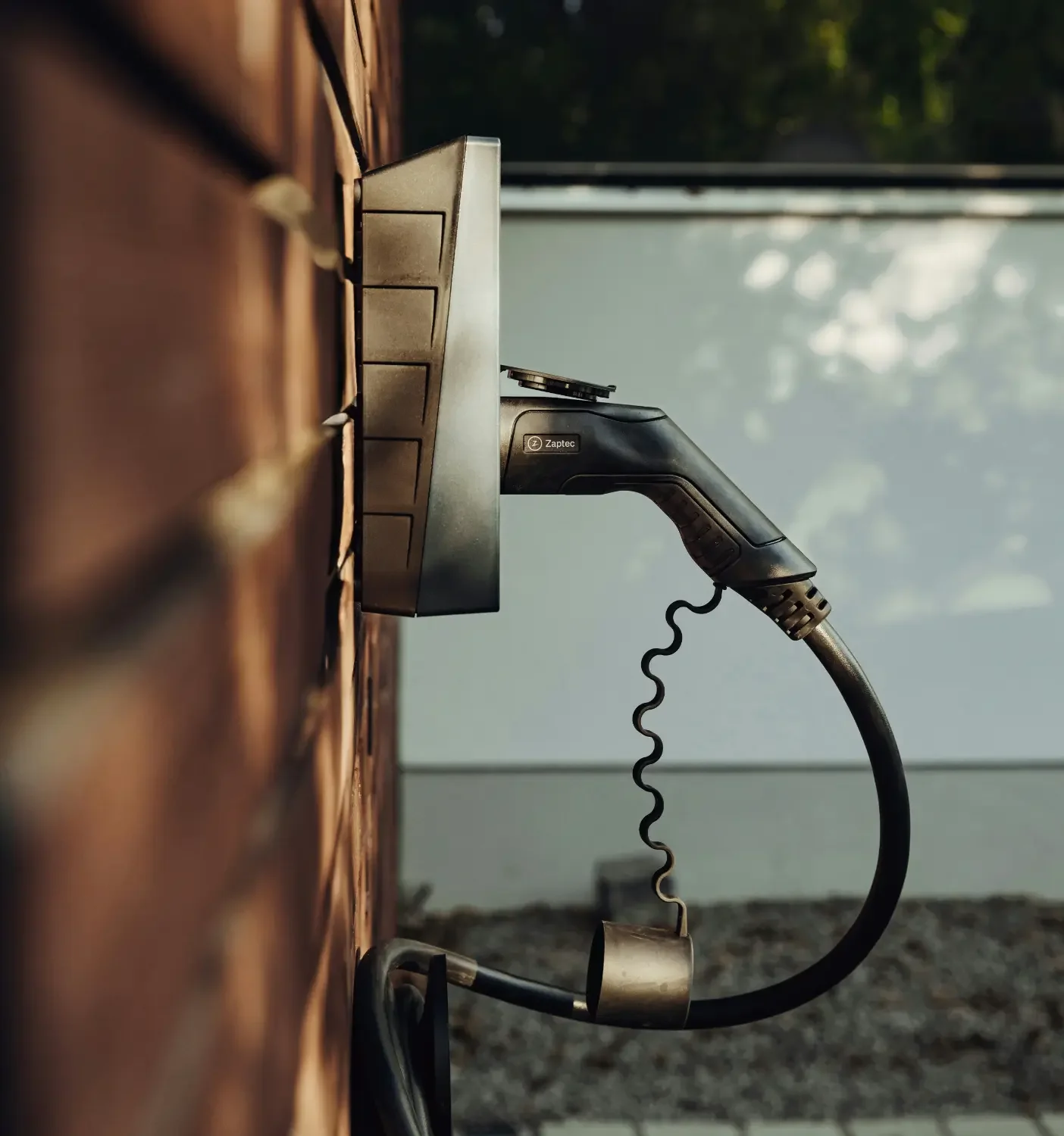 EV Charger mounted to the side of a house
