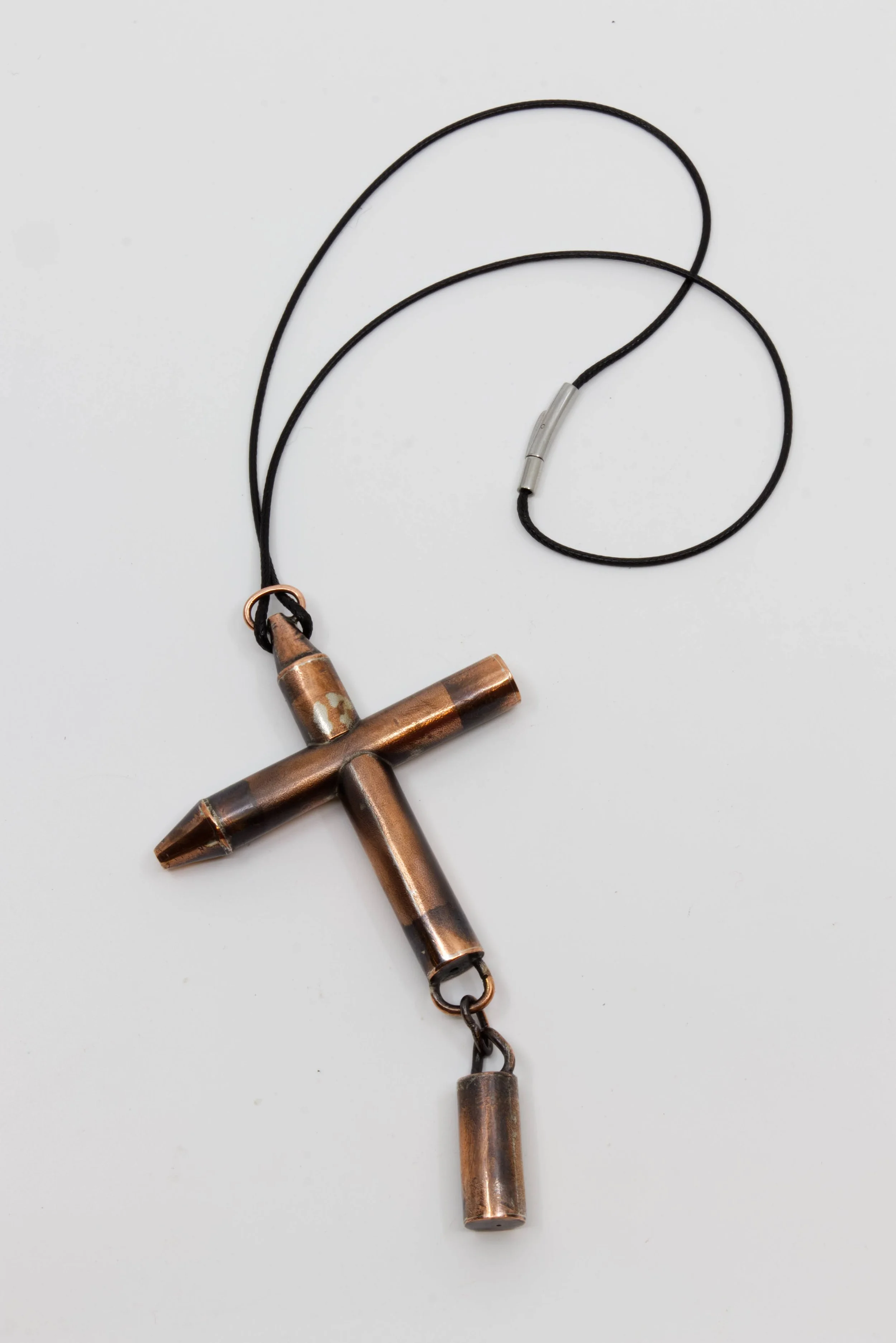 What A Big Thing To Expect A Child to Hold, 2025. Copper, leather cord,  5 ¼ x 3 x ½ inches
