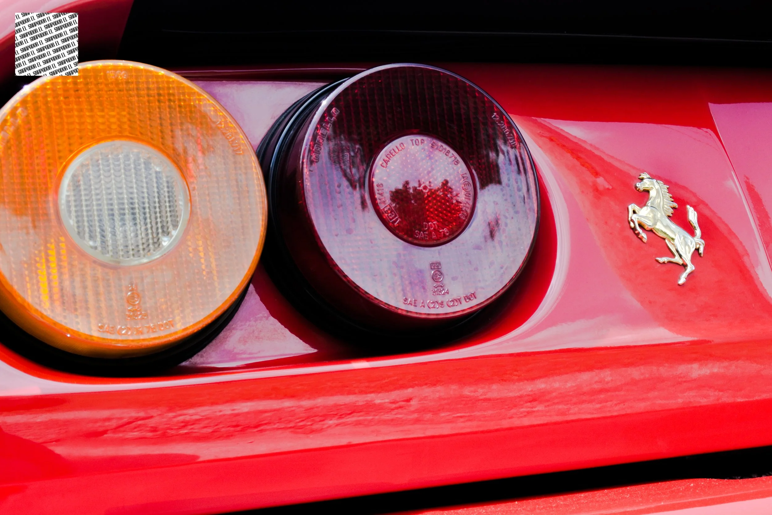 ferrari-rear-gold-horse-tail-lights.jpg