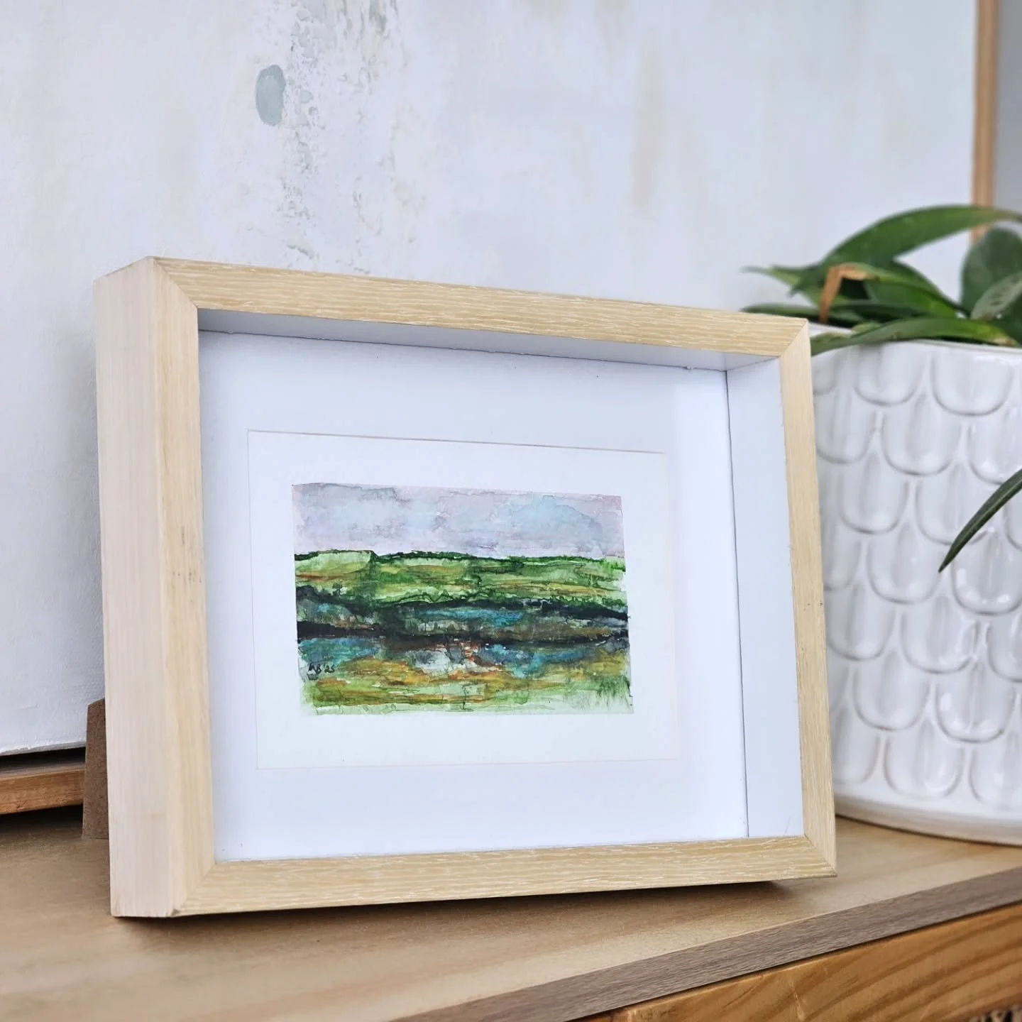 I always say that art needs to grab at your heartstrings. Whether it's big, small, loud or quiet...

 You need to love it. 

And if you feel your heart squeeze and your eyes being drawn back to it... 

Then you need to buy!

This little piece did tha