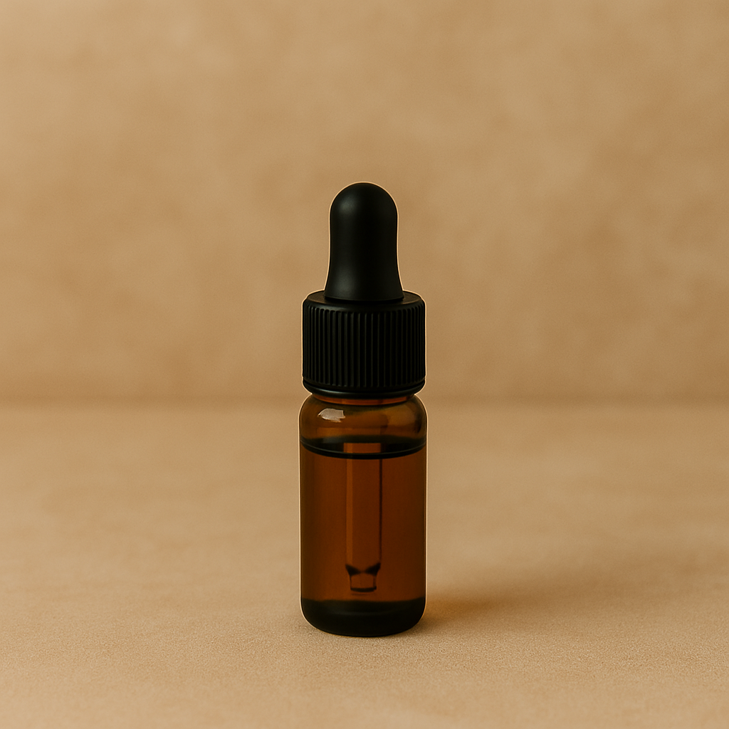 A small amber glass dropper bottle with a black screw cap and dropper on a neutral background.