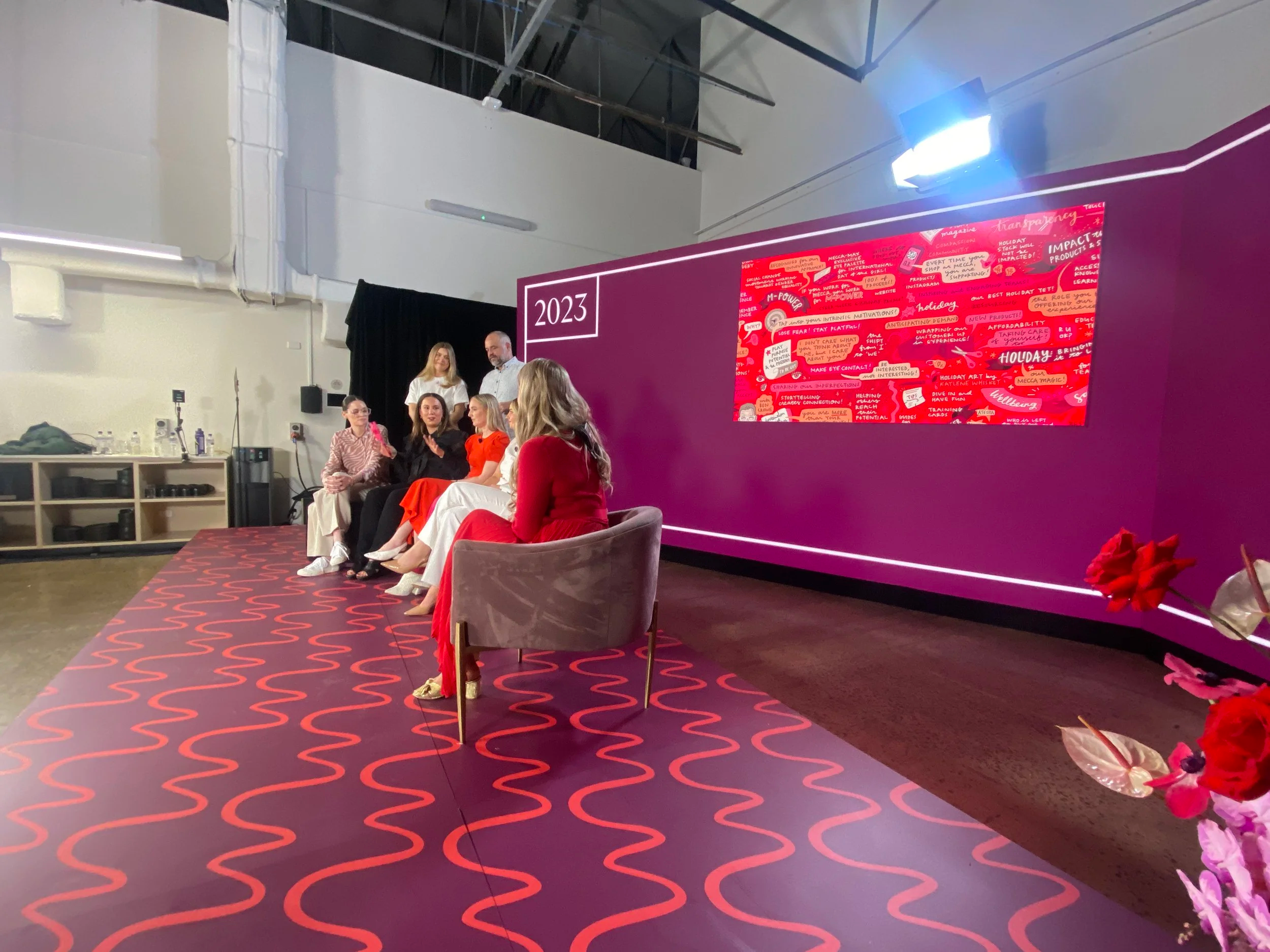 Graphic recording of panel discussion by Melbourne graphic recorder Kate Baxter, captured digitally on iPad and projected behind speakers