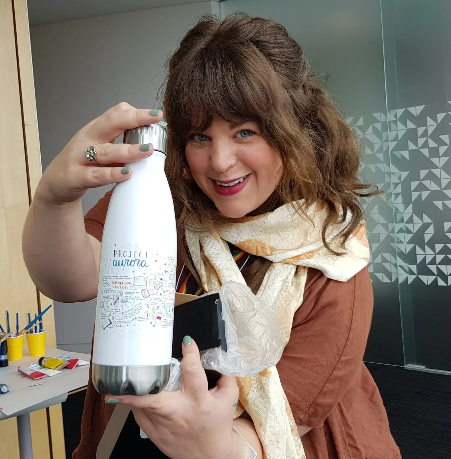 Graphic recording of  leadership conference printed on water bottle by Melbourne graphic recorder Kate Baxter, captured in marker pen on large format paper