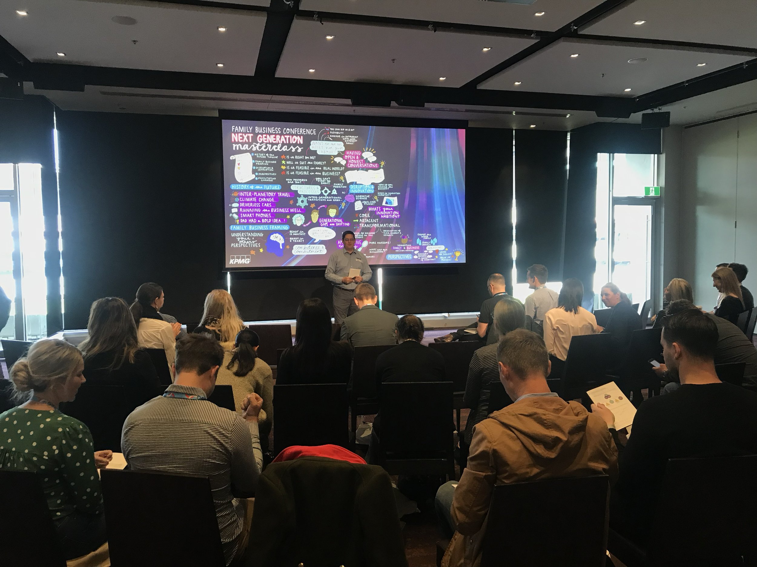 Scribe on screen in plenary.jpg