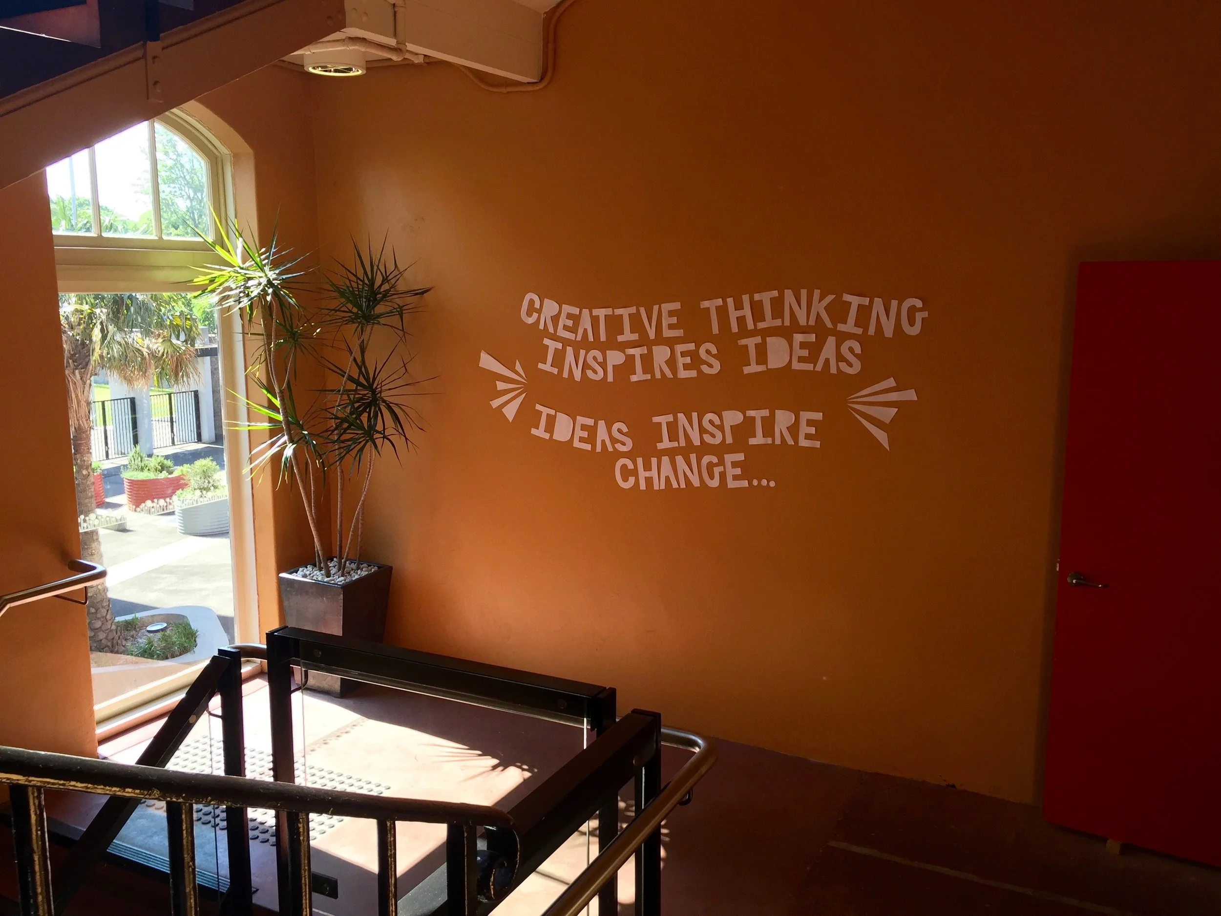 paper cut on orange wall.jpg
