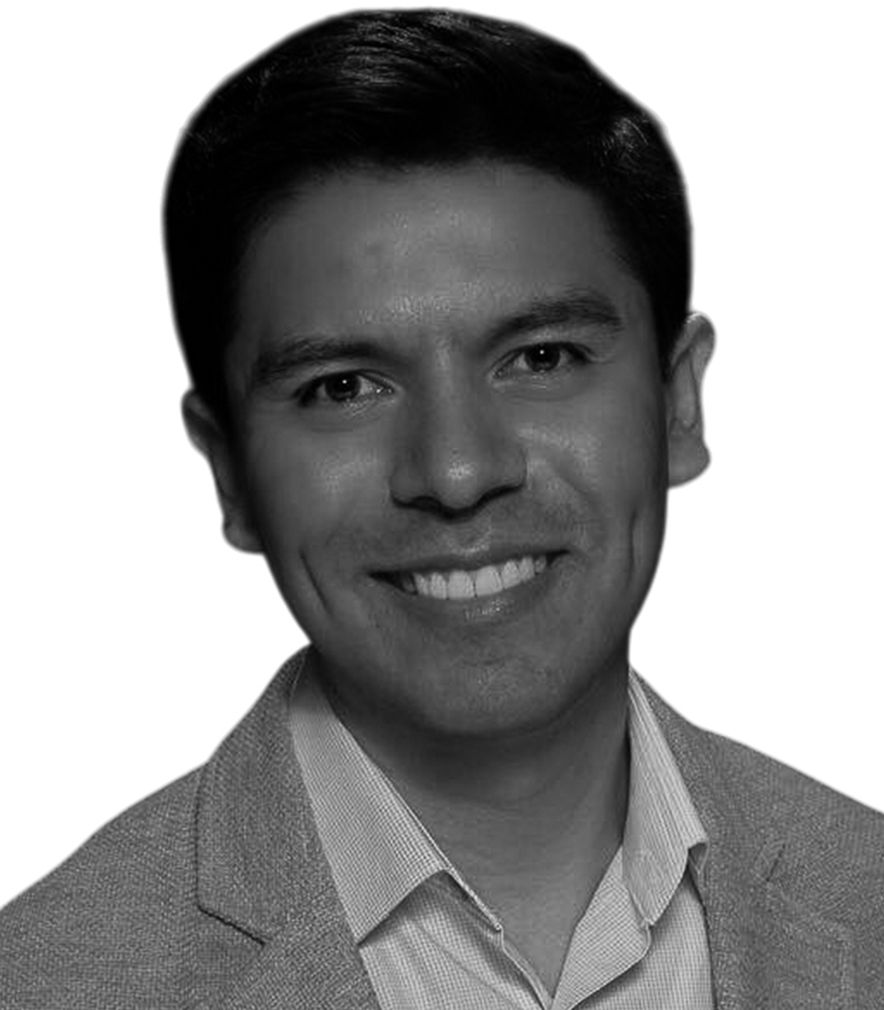 Black and white portrait of a smiling man in a suit and collared shirt.