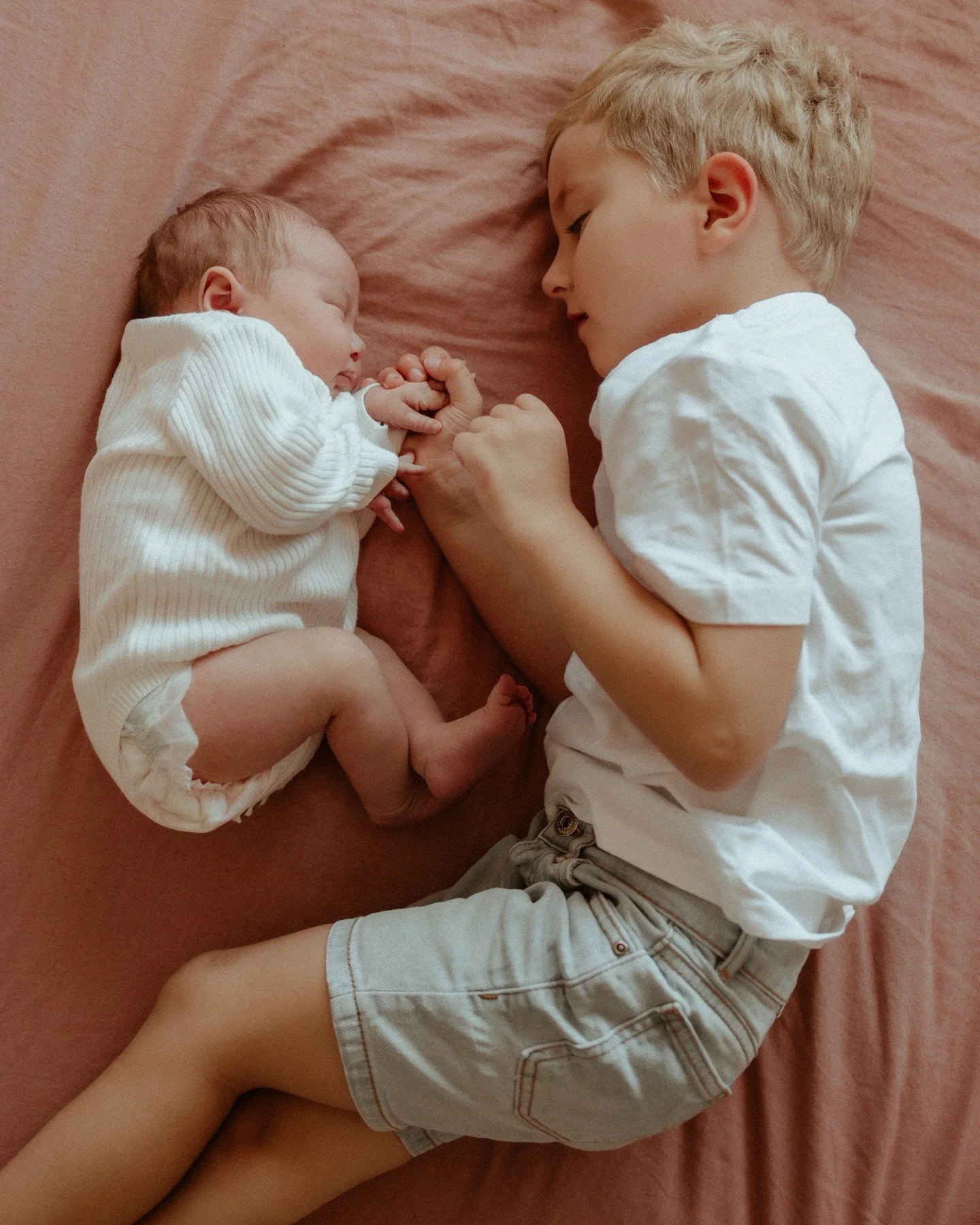 This little bond 🥹
I love seeing these first sweet moments between siblings. Big brother is still getting to know his tiny new sidekick. The gentleness, the curiosity, the love!

Little does he know, this little human is about to become his built-in