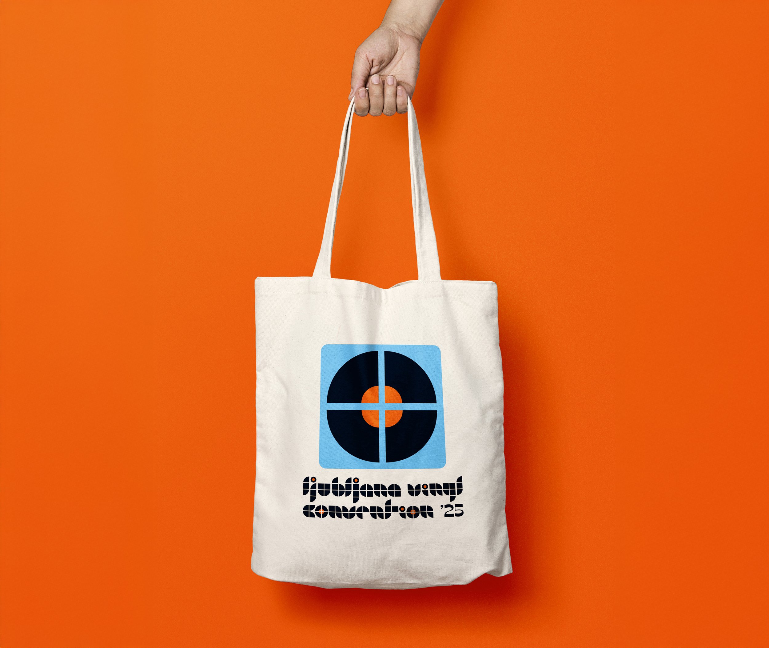 LVC2025-tote-bag-mockup-7-inch-orange-horizontal.jpg
