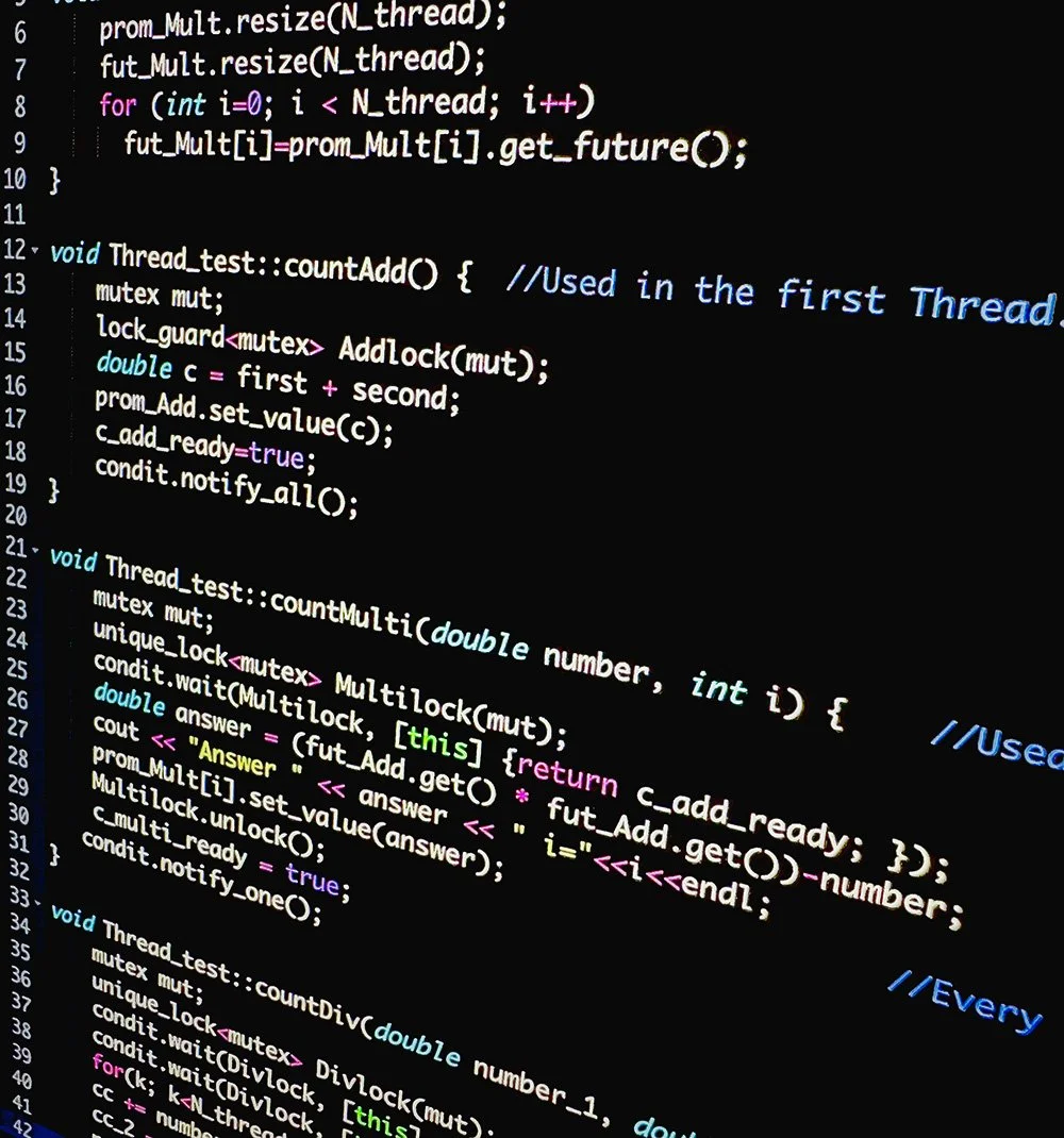 Close-up of C++ code with thread handling, mutex, and lock mechanisms on a black background.